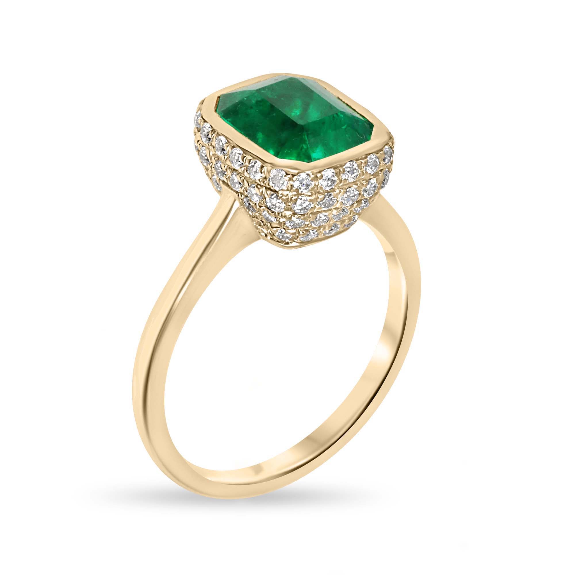 14K Colombian emerald and diamond pave halo statement ring by JR Colombian Emeralds, featuring a 3.19tcw central emerald.