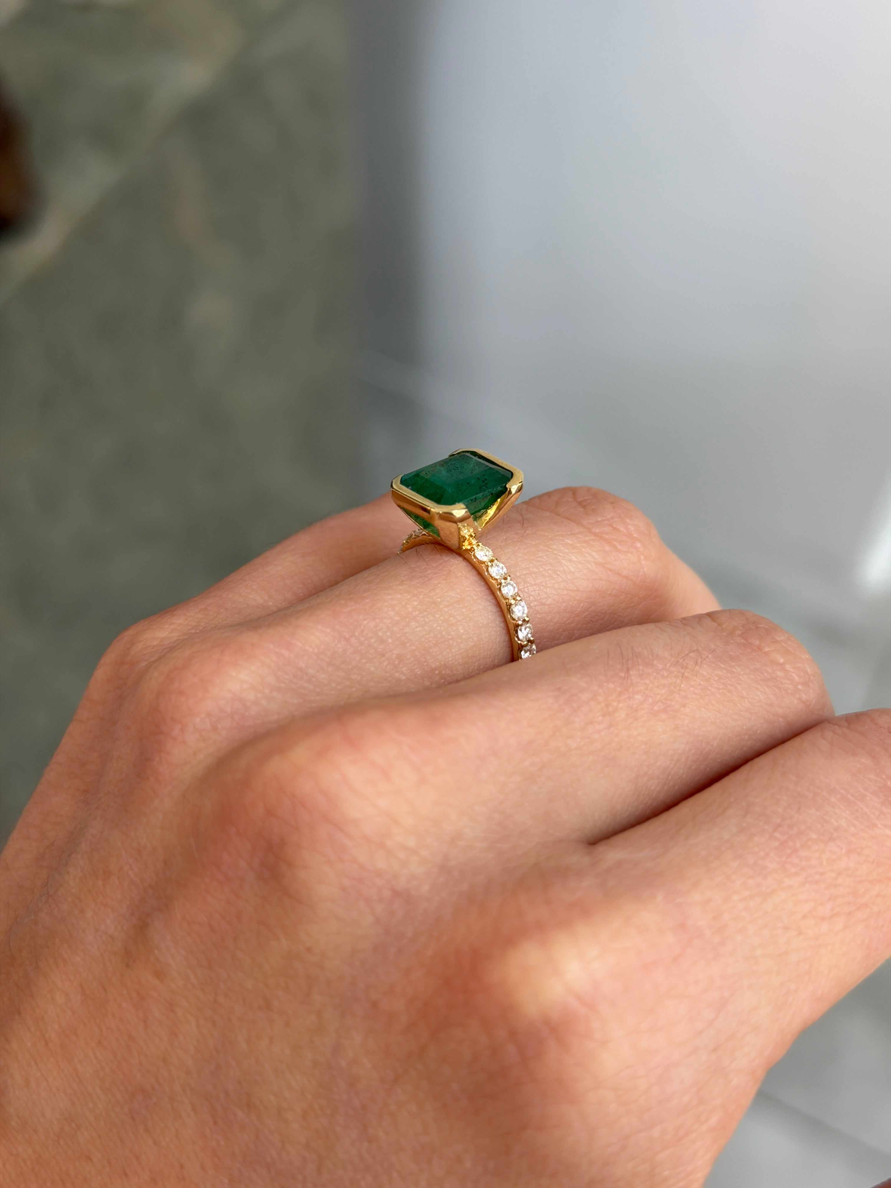 Natural emerald and diamond stacking ring in 14K gold, featuring semi bezel setting and 3.69 tcw for a sophisticated look.