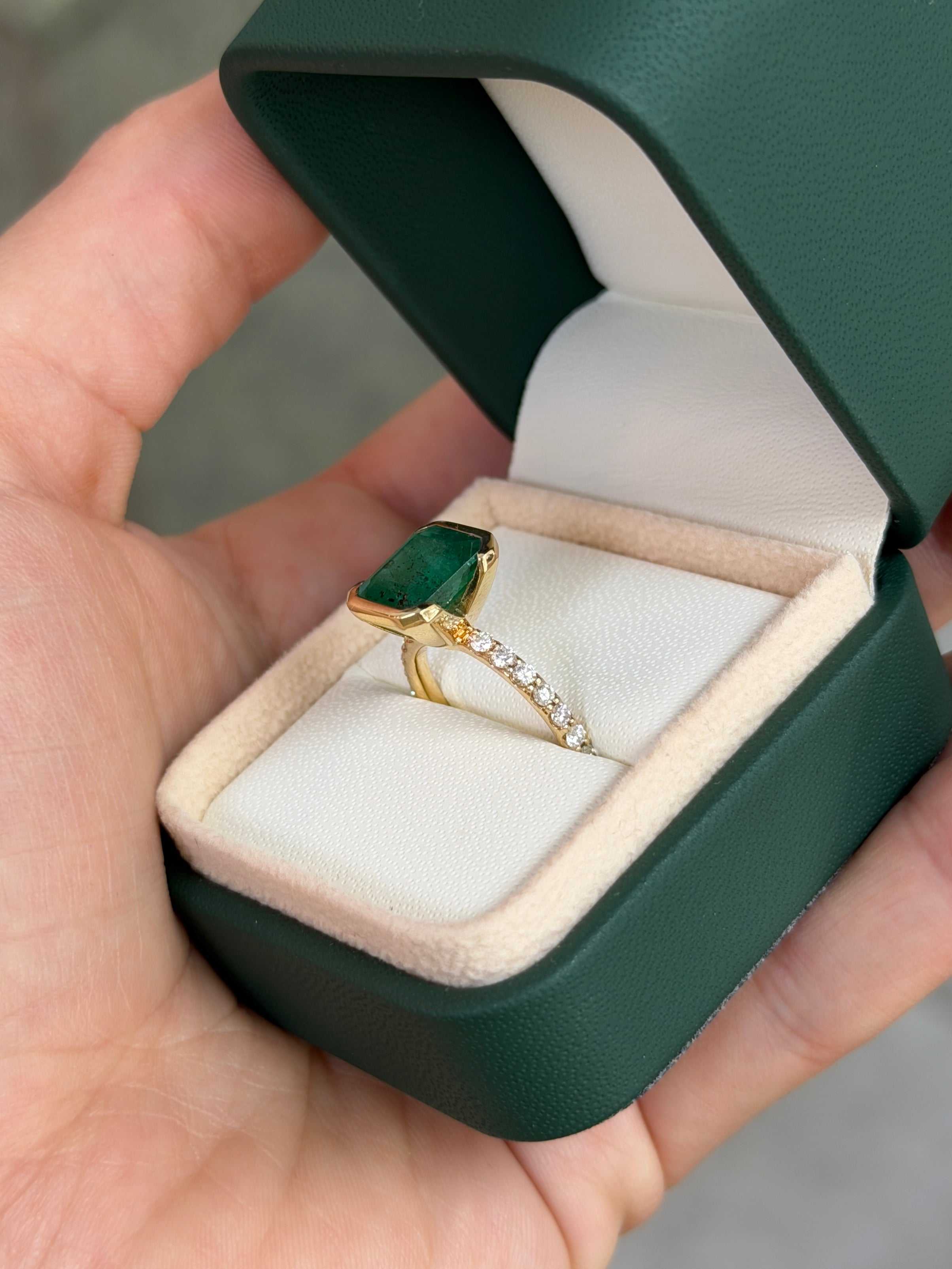 Natural emerald and diamond accent stacking ring in 14K gold, featuring a 3.69tcw semi-bezel emerald solitaire by JR Colombian Emeralds.
