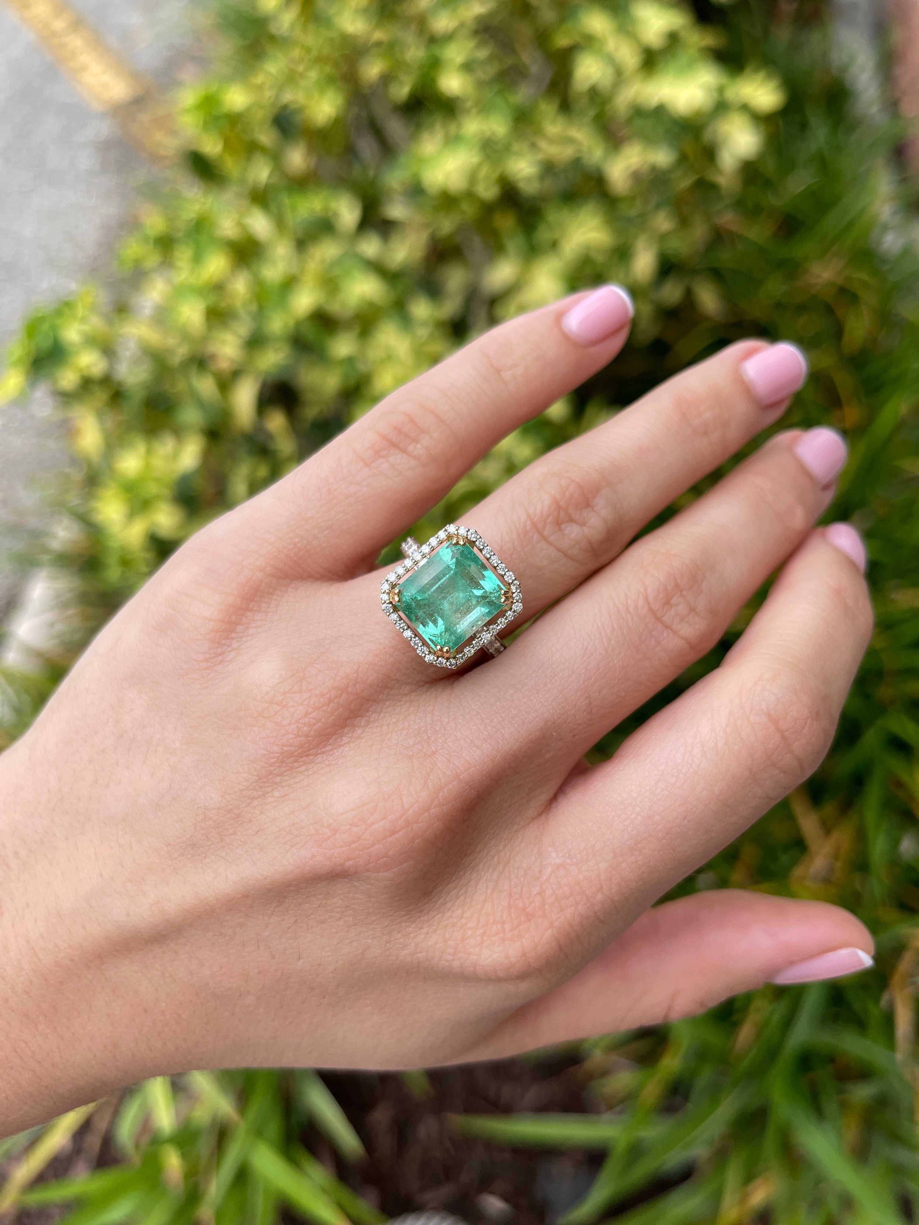 Large Colombian emerald Asscher cut gemstone with diamond halo on 18K gold engagement ring by JR Colombian Emeralds.