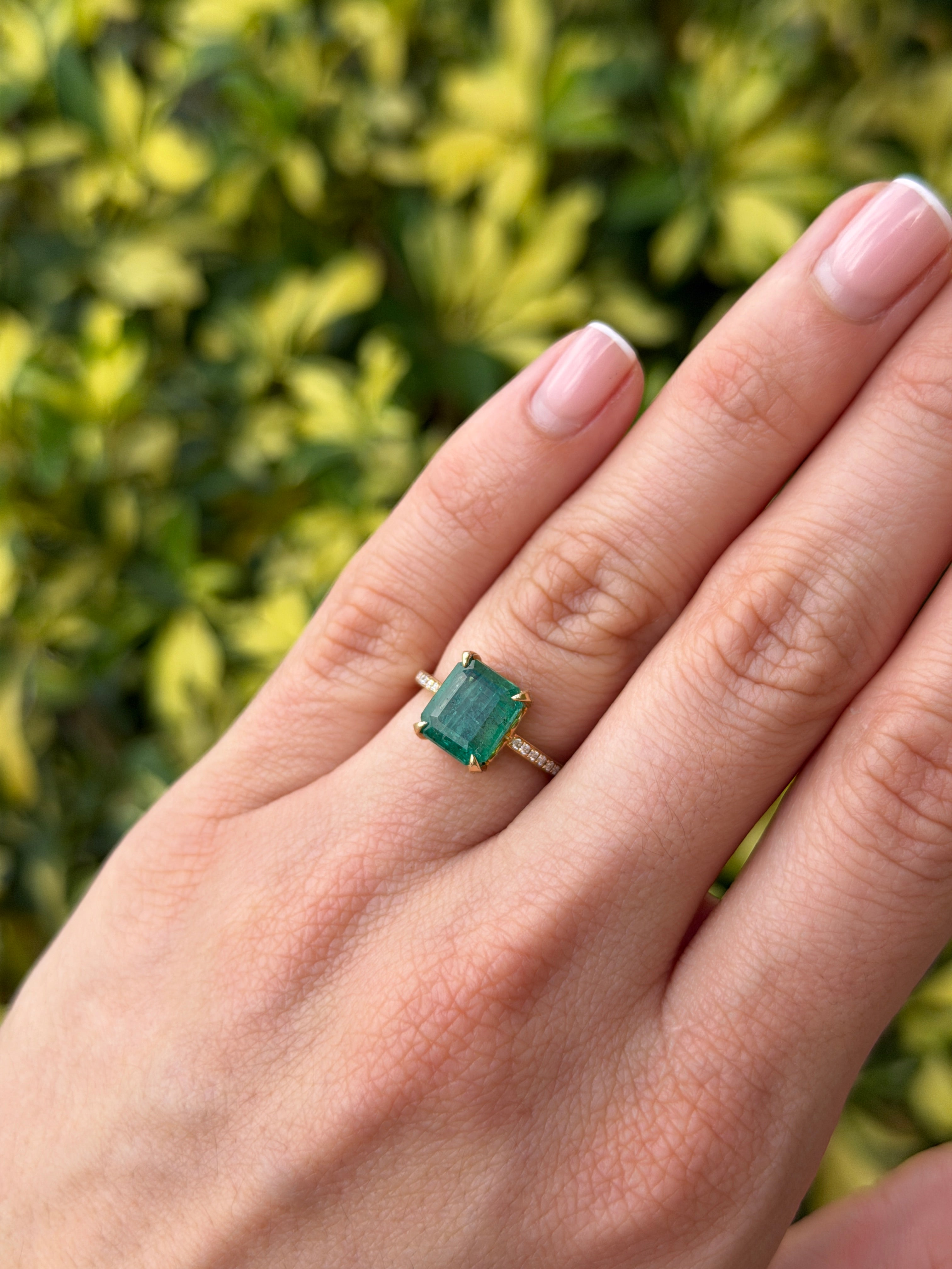 14K gold engagement ring featuring a 3.50tcw natural emerald center stone with a hidden diamond halo and shank by JR Colombian Emeralds.