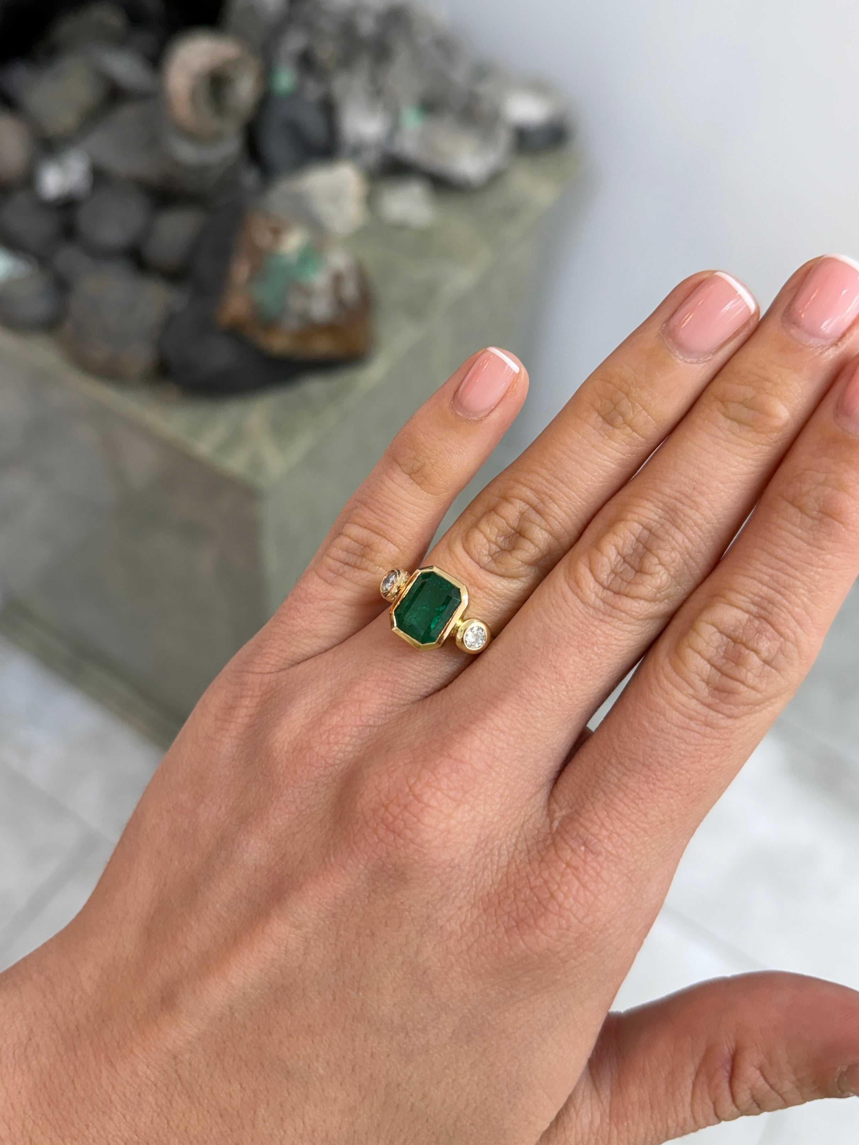 Natural dark emerald and round diamond three-stone ring in 18K gold by JR Colombian Emeralds, featuring a 4.53tcw gemstone design.