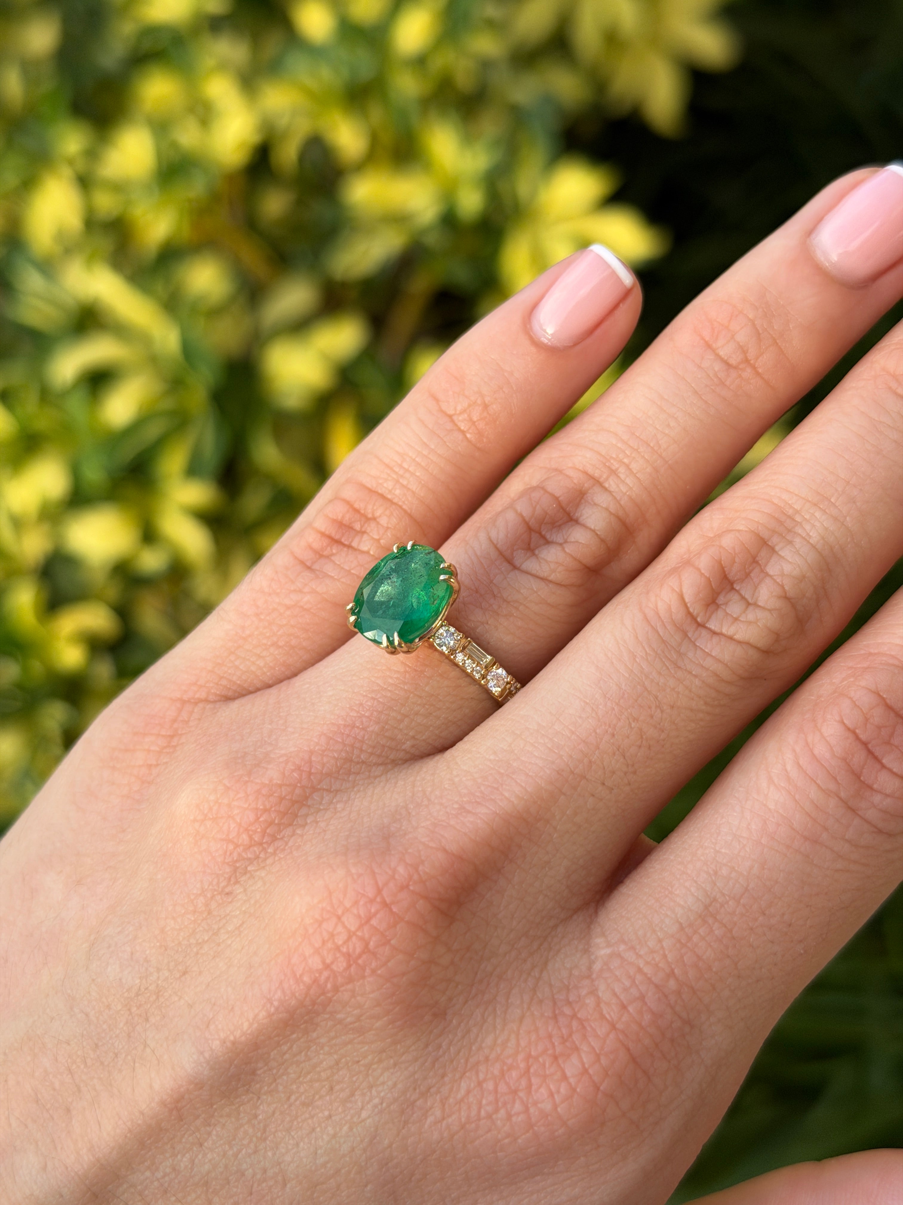 Natural oval emerald and lab diamond accented band in 14K gold, featuring 4.35 tcw from JR Colombian Emeralds.