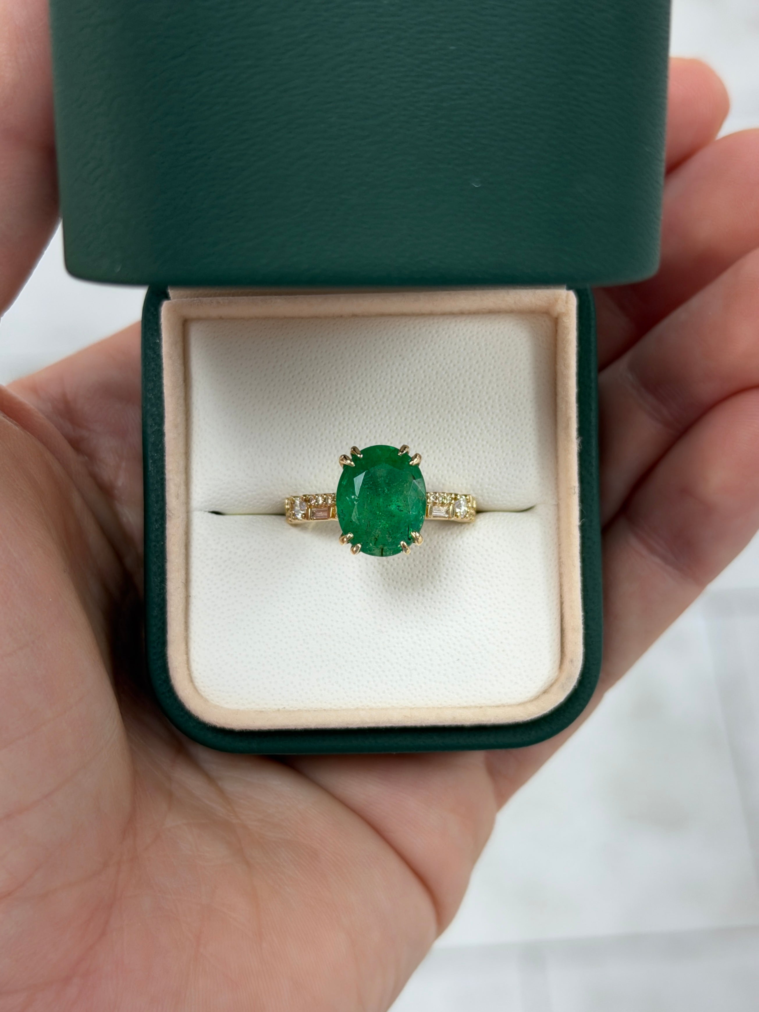 Natural oval emerald and lab diamond accented band in 14K gold, featuring 4.35tcw from JR Colombian Emeralds.