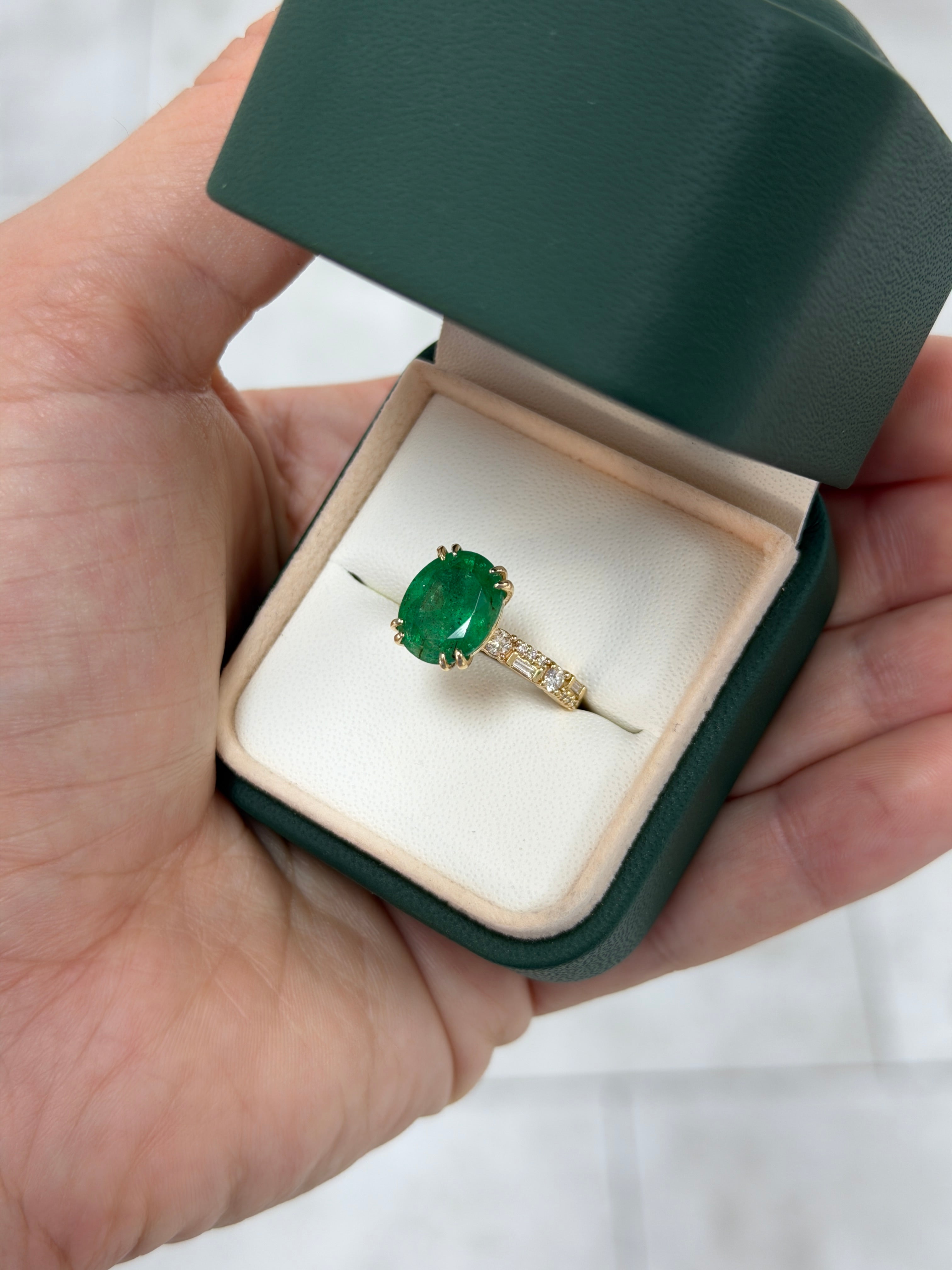 Natural oval emerald and lab diamond accented band in 14K gold by JR Colombian Emeralds, showcasing the detailed jewelry design.