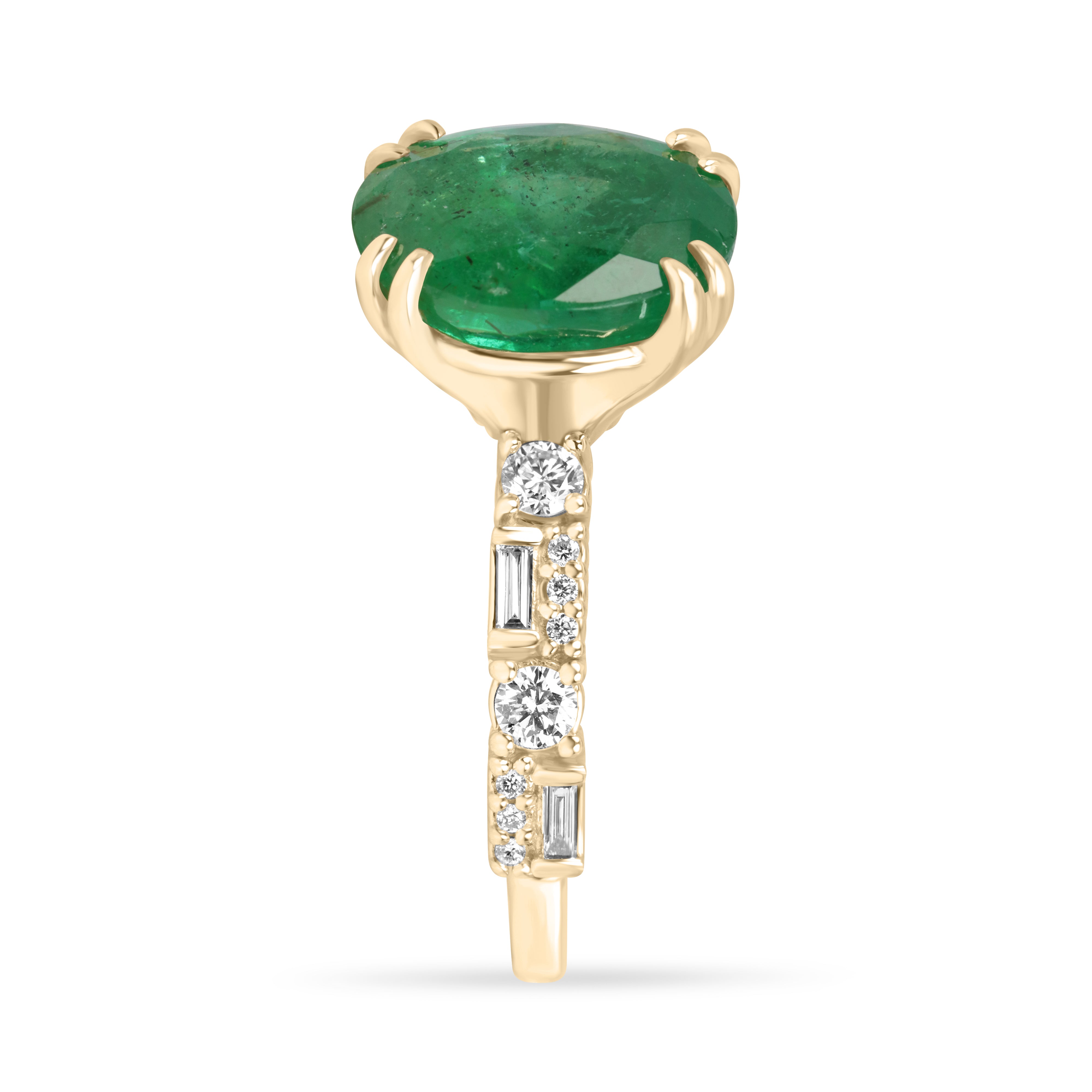 Natural oval emerald and lab diamond accented band in 14K gold by JR Colombian Emeralds, showcasing the ring's detailed design.