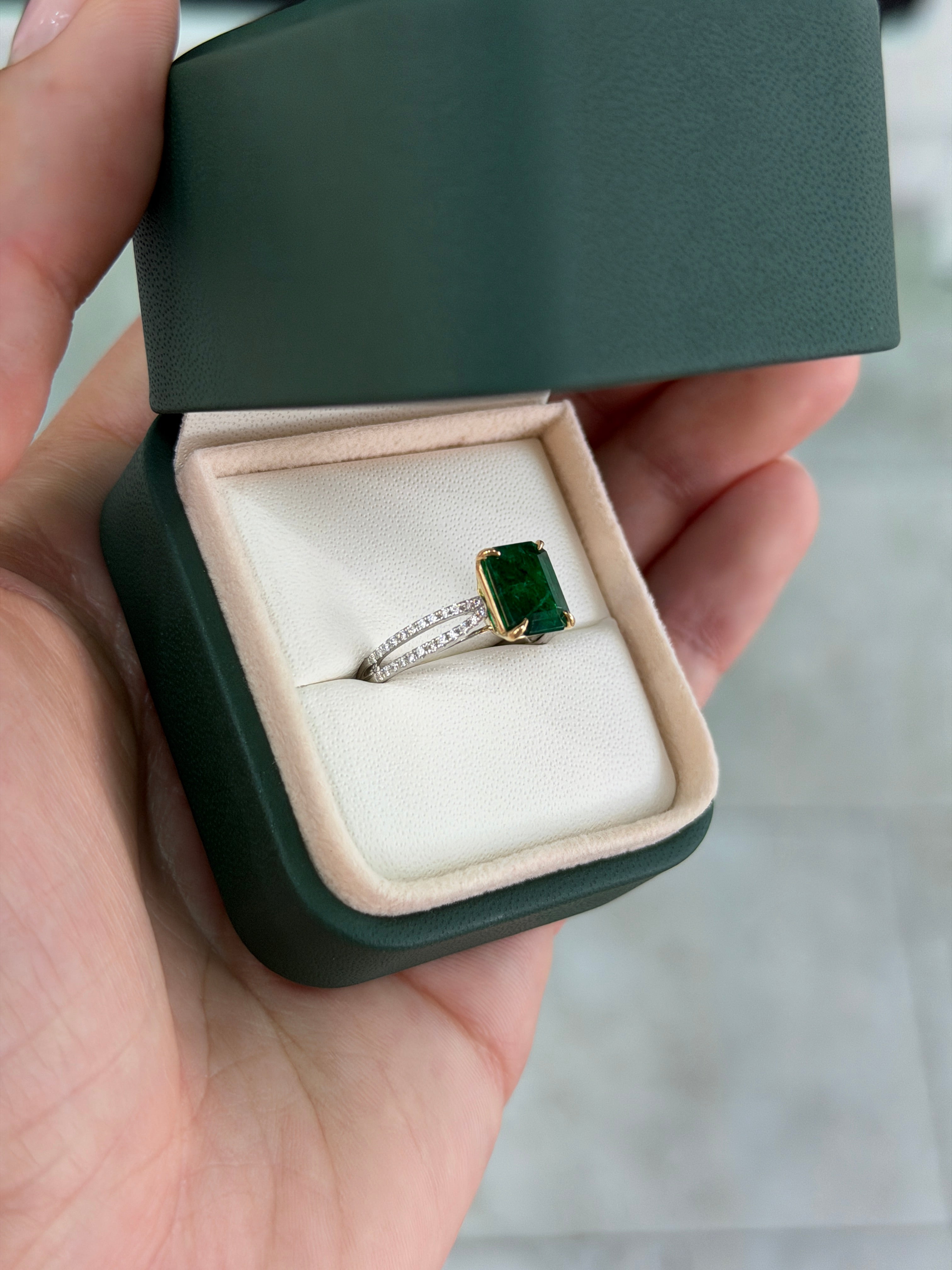 Deep green emerald and diamond split shank engagement ring in 18K or platinum, featuring a 2.75 carat total weight, by JR Colombian Emeralds.