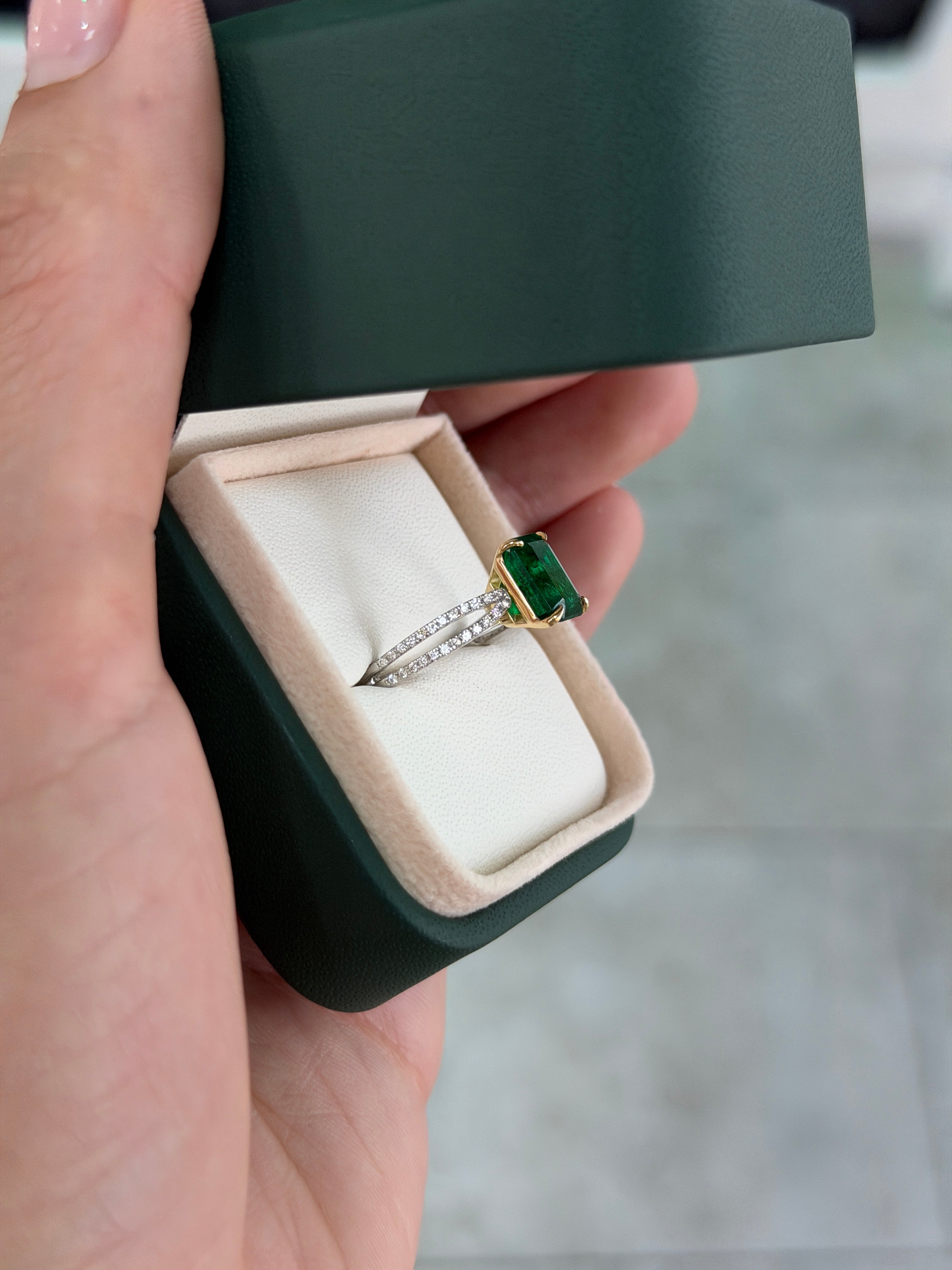 Deep green emerald and diamond split shank engagement ring in 18K/plat with 2.75tcw from JR Colombian Emeralds.
