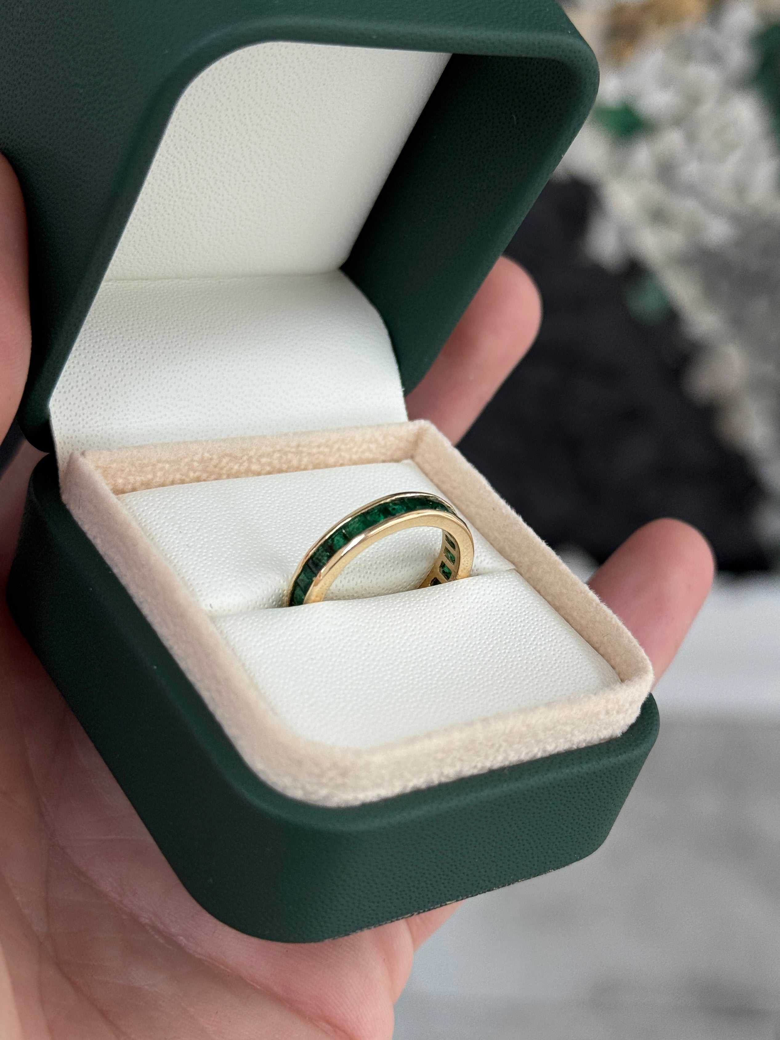 JR Colombian Emeralds eternity band with princess cut natural emeralds, channel set in size 6 and 8, as seen on Instagram.