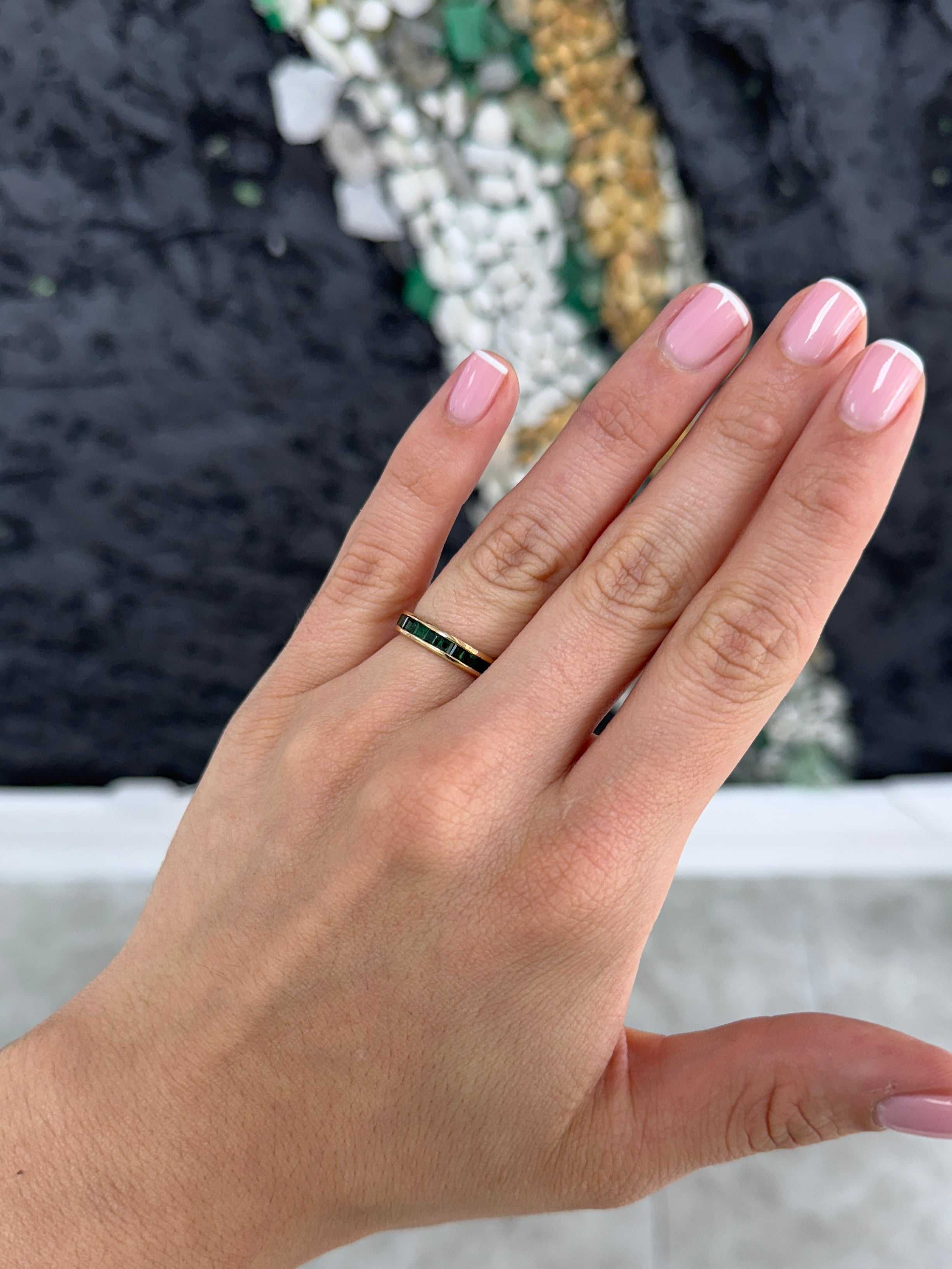 JR Colombian Emeralds eternity band featuring princess cut natural emeralds, channel set, size 6 and 8, as seen on Instagram.