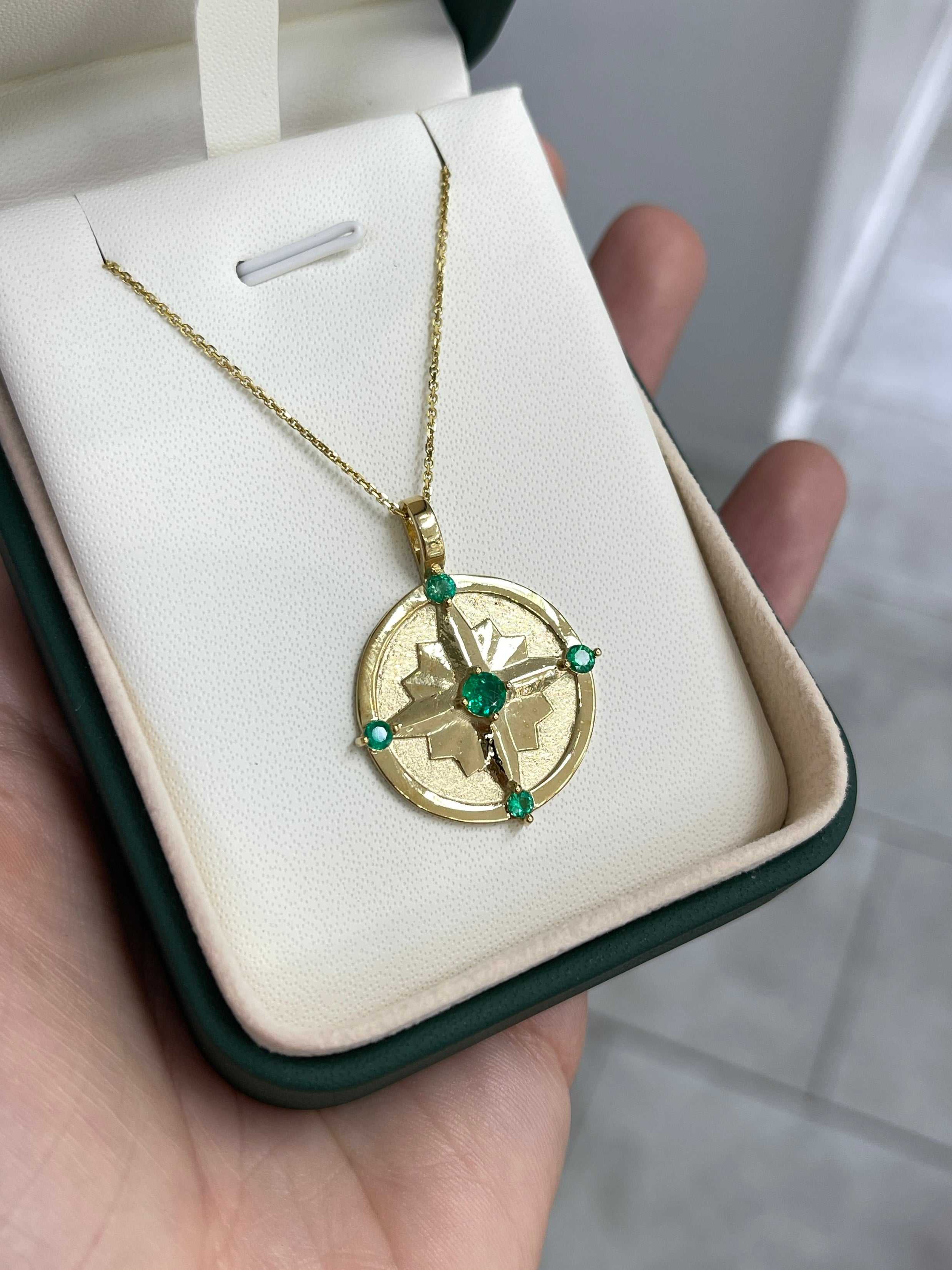 Emerald gold compass medallion necklace with 0.43 carats AAA+ emeralds in 14K gold, jewelry by JR Colombian Emeralds.