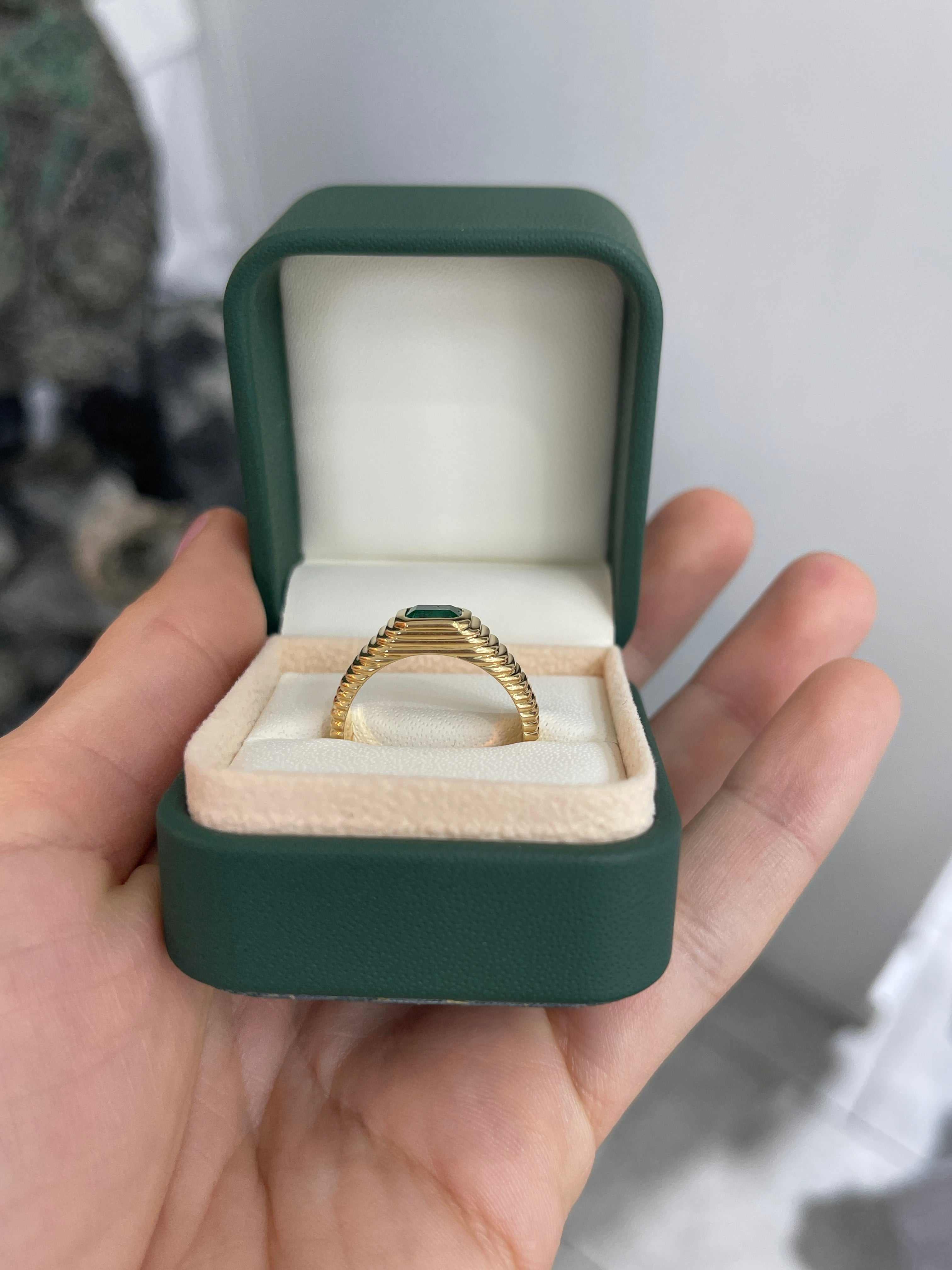 Men's 0.81 carat Colombian emerald ring with ribbed gold bezel in 18K yellow gold, size 9, by JR Colombian Emeralds.
