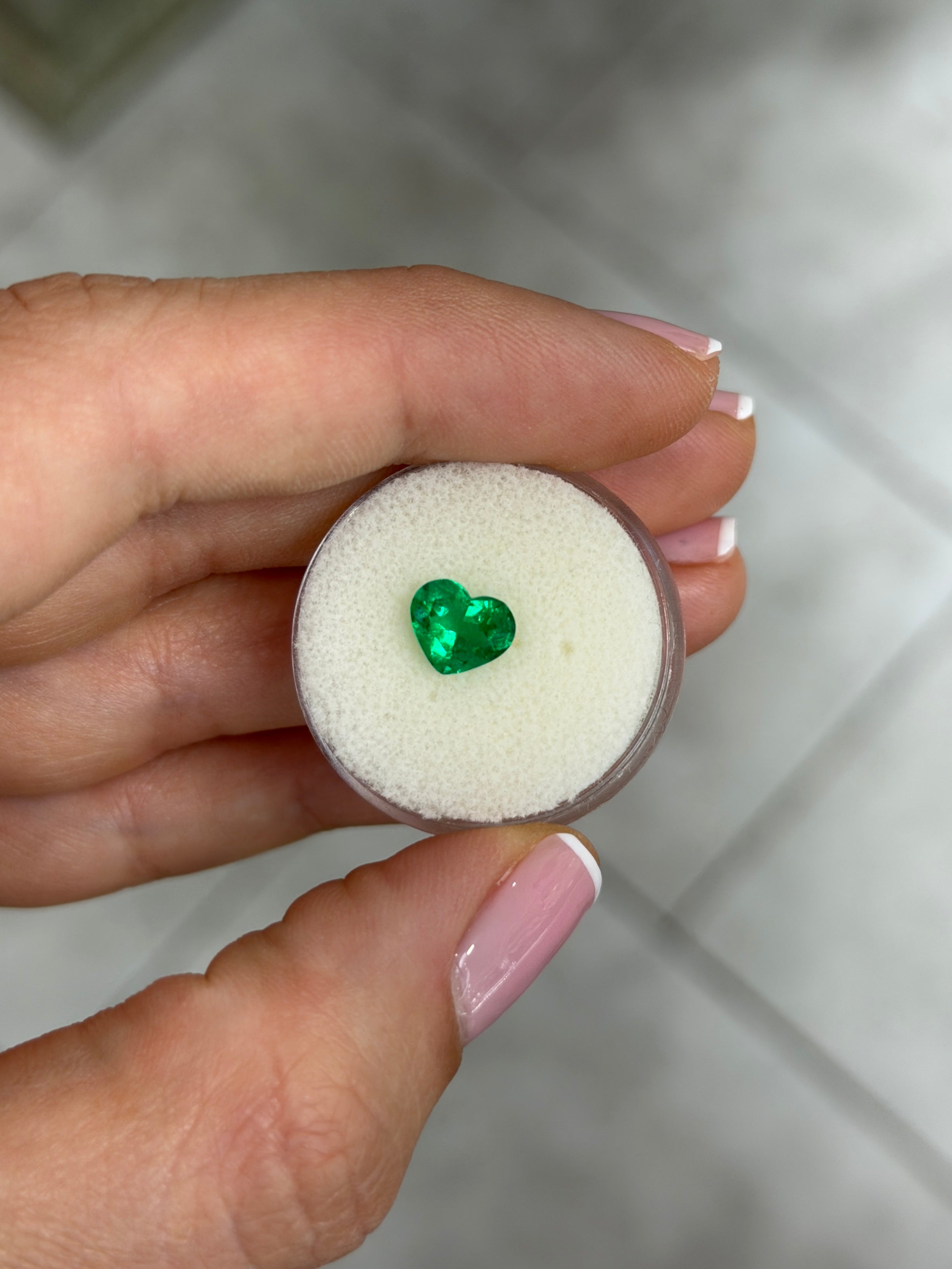 Natural Colombian emerald loose stone, 1.08 carats, AAA+ Muzo green emerald in heart cut, from JR Colombian Emeralds.