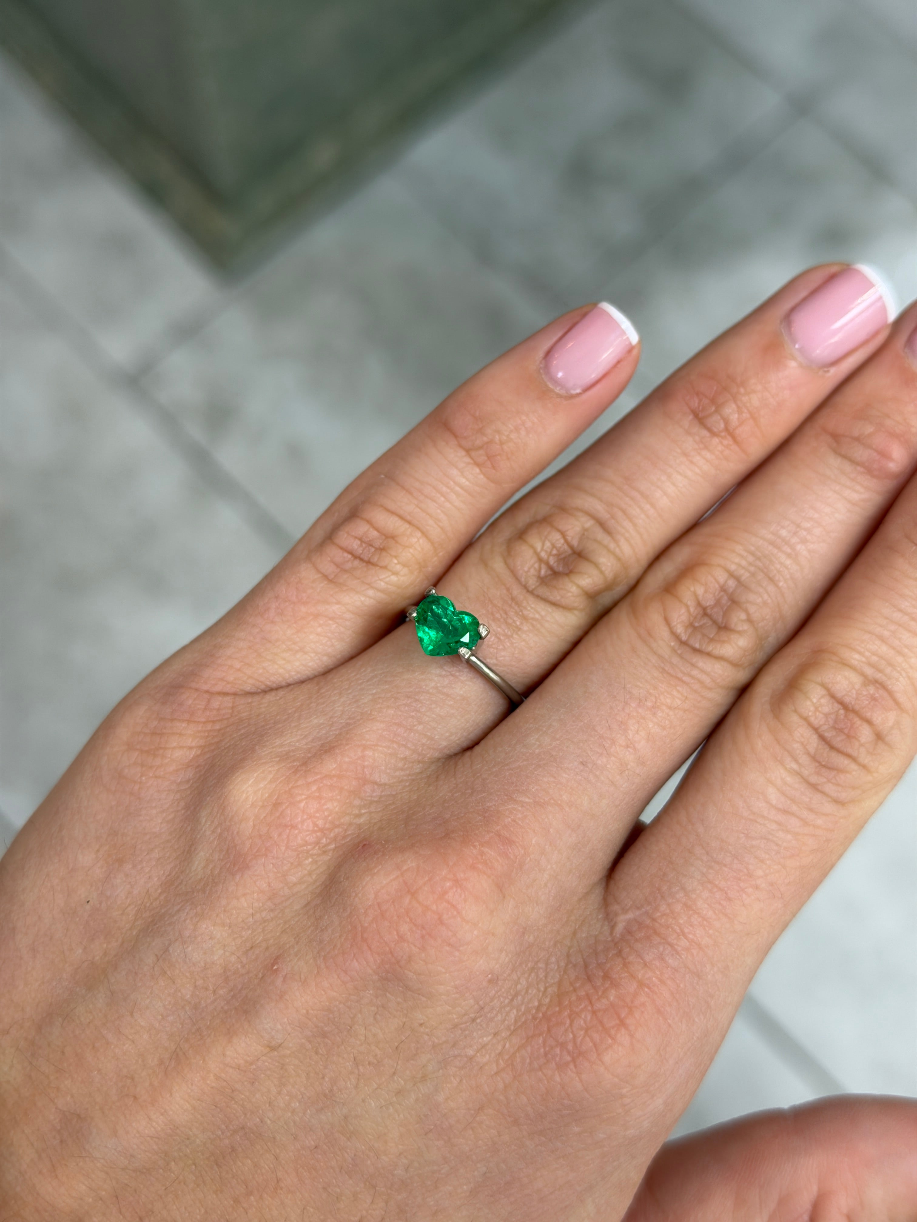 Natural 1.08 carat Colombian emerald loose stone with heart cut, AAA+ Old Mine Muzo green, from JR Colombian Emeralds.