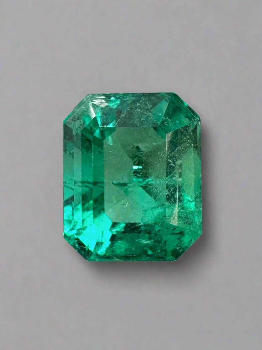 Bluish green 1.22 carat natural Colombian emerald in an emerald cut, showcasing its vibrant color and clarity.
