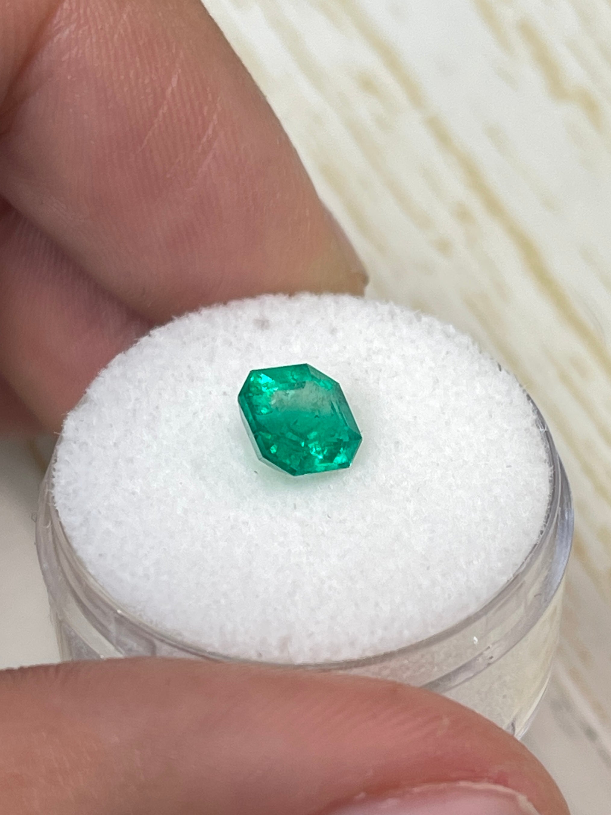Bluish green 1.24 carat Asscher cut Colombian emerald, natural, unset gemstone from JR Colombian Emeralds.