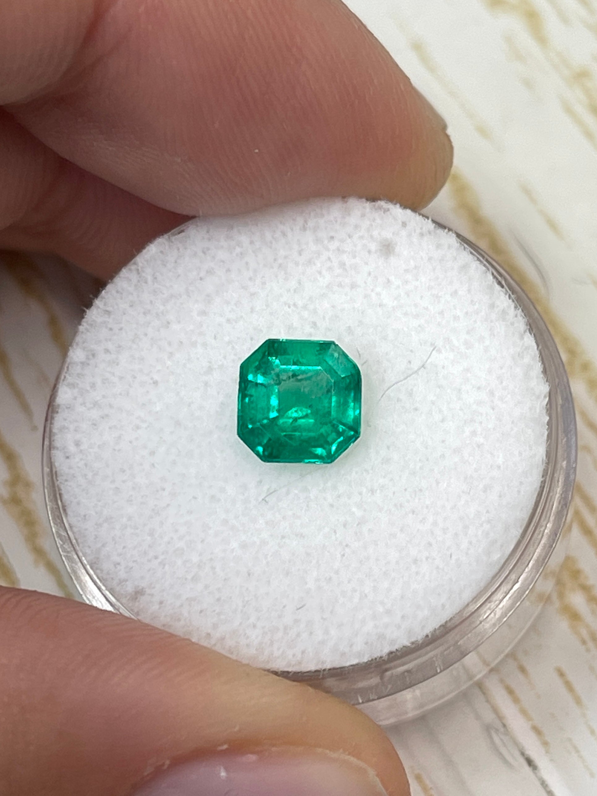 Asscher cut 1.24 carat bluish green Colombian emerald gemstone, natural, unset, from JR Colombian Emeralds.