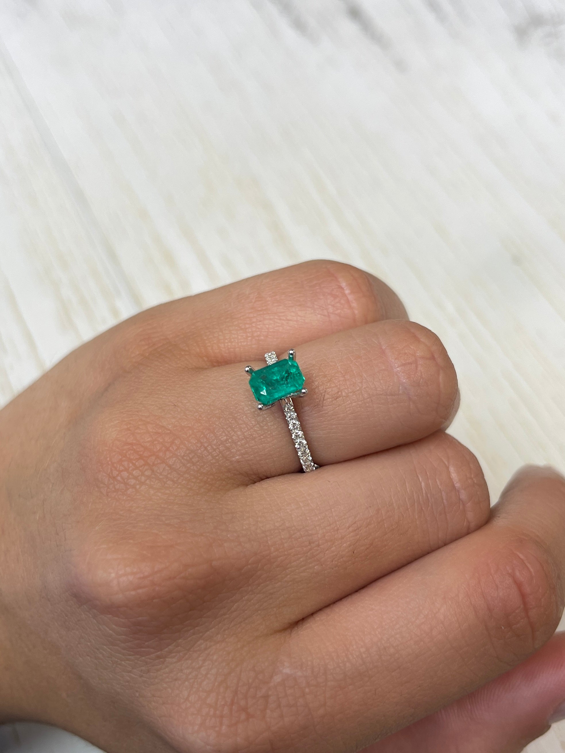 Loose 1.31 carat Colombian emerald in an emerald cut, showcasing vibrant green color and clarity from JR Colombian Emeralds.