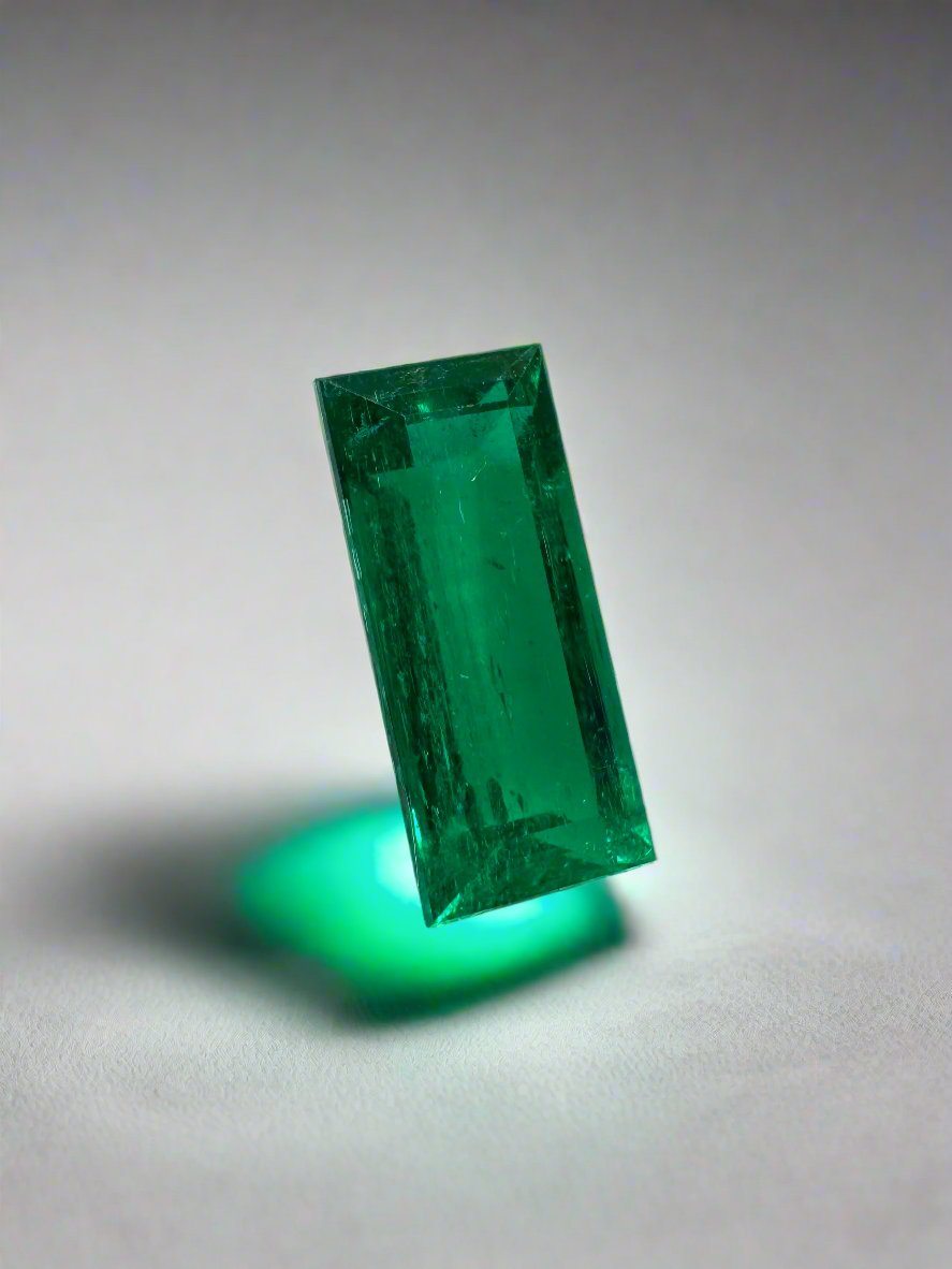 Loose 1.38 carat AAA+ Muzo Colombian emerald baguette, natural green gemstone with vivid color and clarity, from JR Colombian Emeralds.