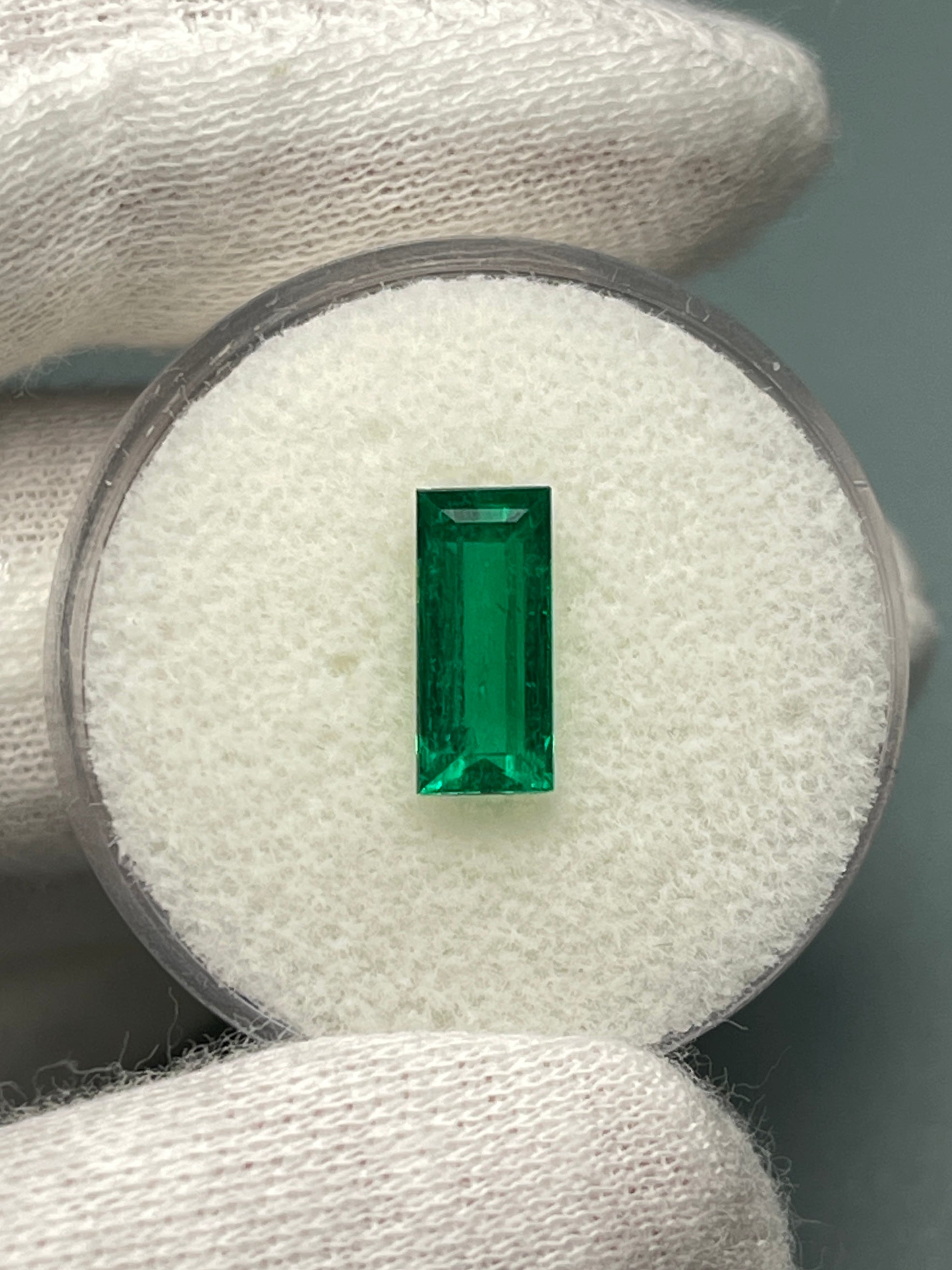 Natural 1.38 carat AAA+ Muzo Colombian emerald loose baguette gemstone, 10x5mm, from JR Colombian Emeralds.