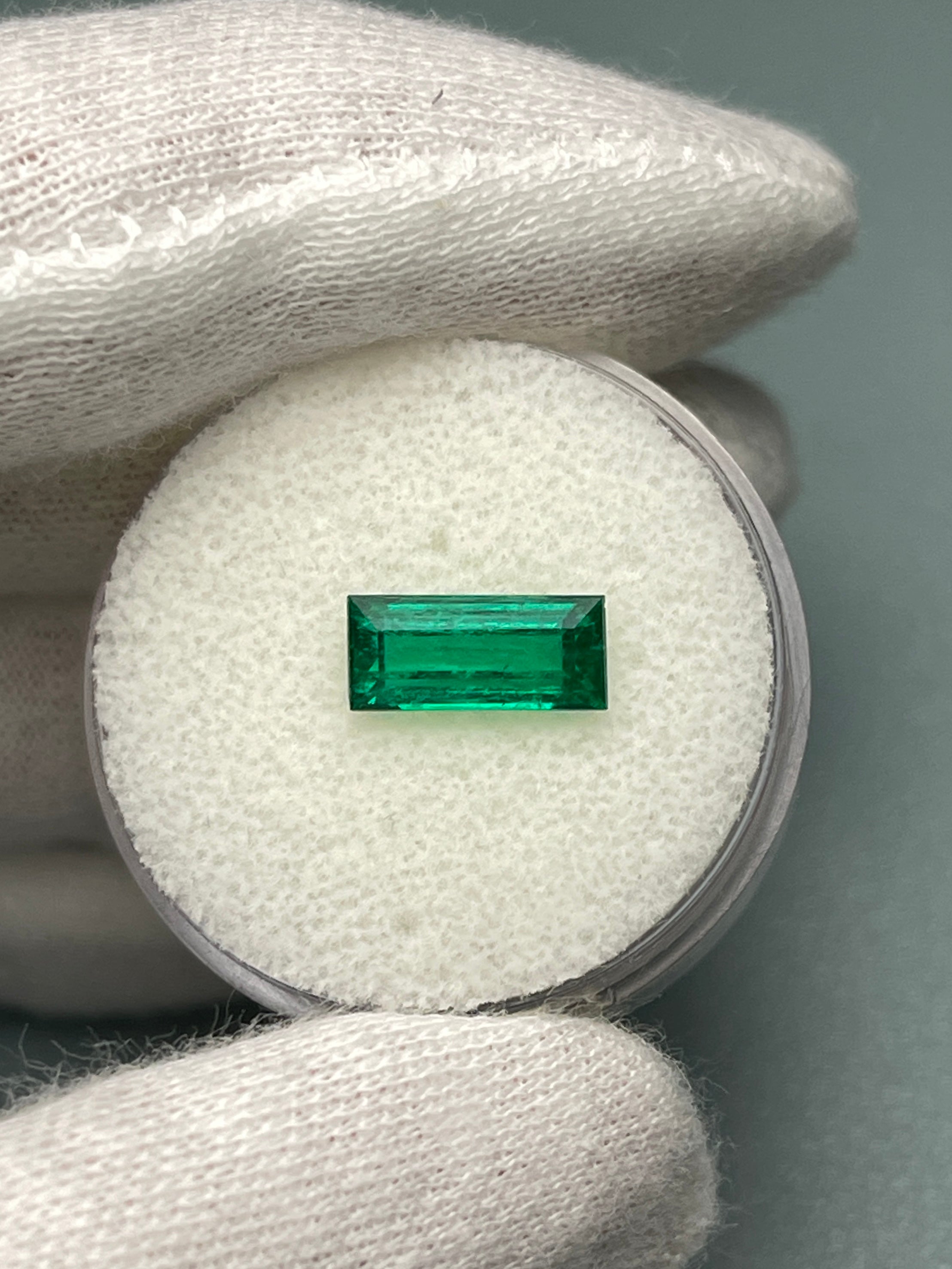 Loose 1.38 carat AAA+ Muzo Colombian emerald baguette gemstone, natural green color, cut and polished by JR Colombian Emeralds.