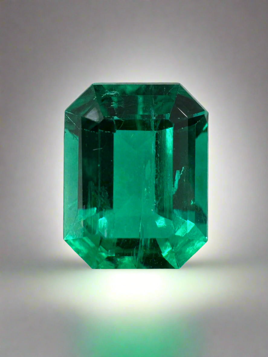 Vivid bluish green 1.49 carat Colombian emerald cut gemstone from JR Colombian Emeralds, showcasing its vibrant color and clarity.
