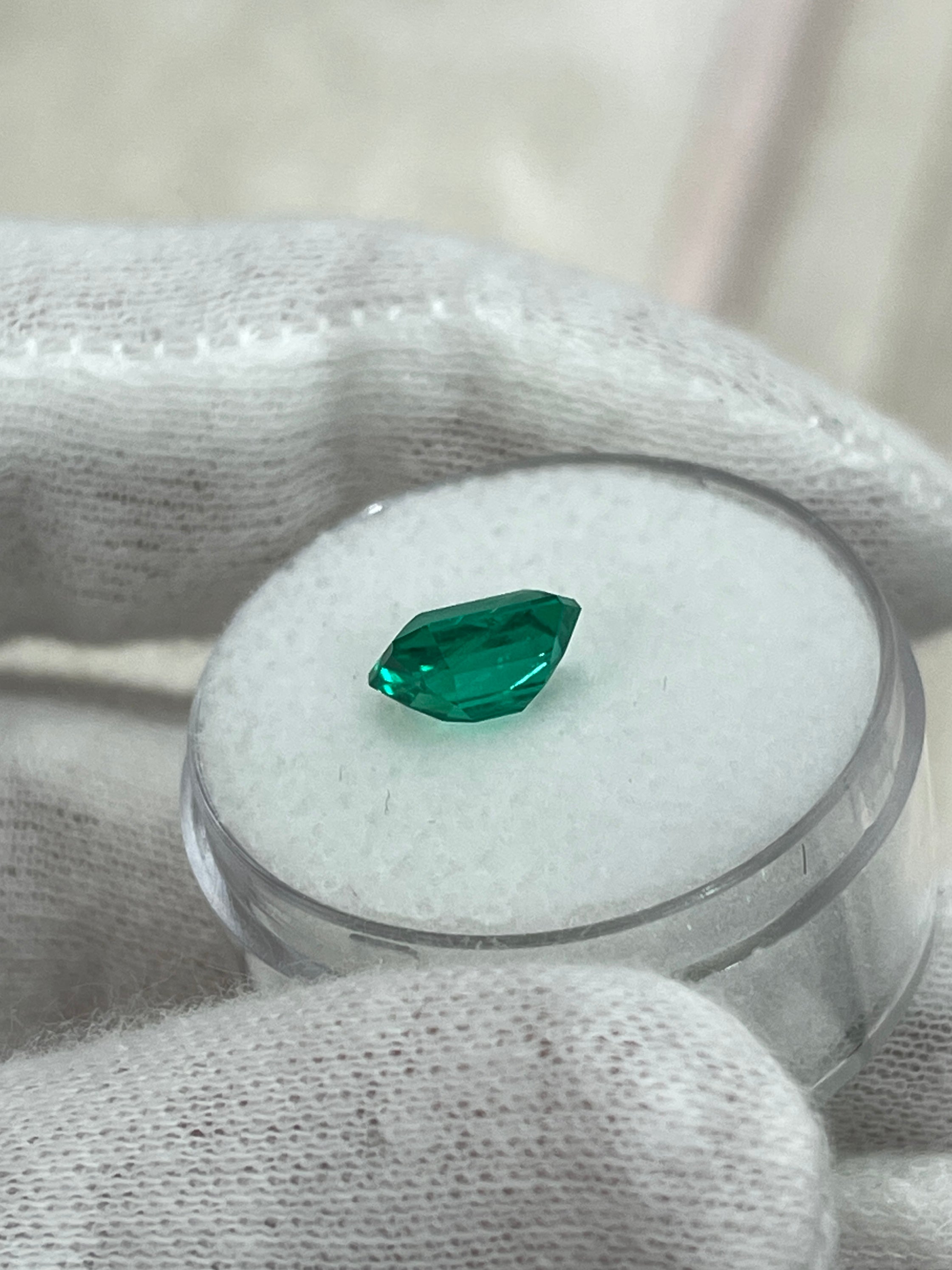 Vivid bluish green 1.49 carat Colombian emerald cut by JR Colombian Emeralds, showcasing clarity and vibrant color.