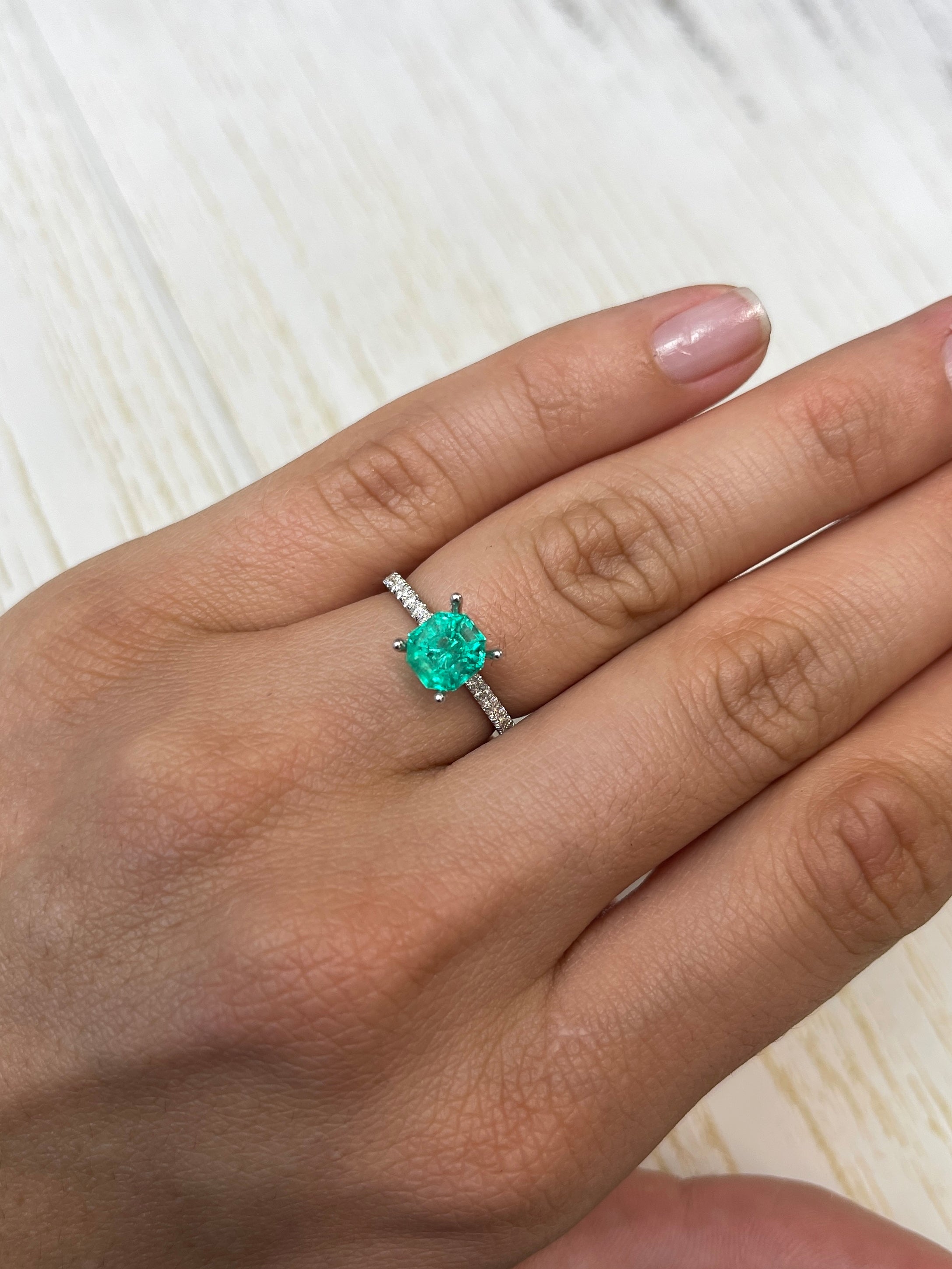 Bluish green 1.50 carat octagon cut natural Colombian emerald gemstone, unset and displayed by JR Colombian Emeralds.