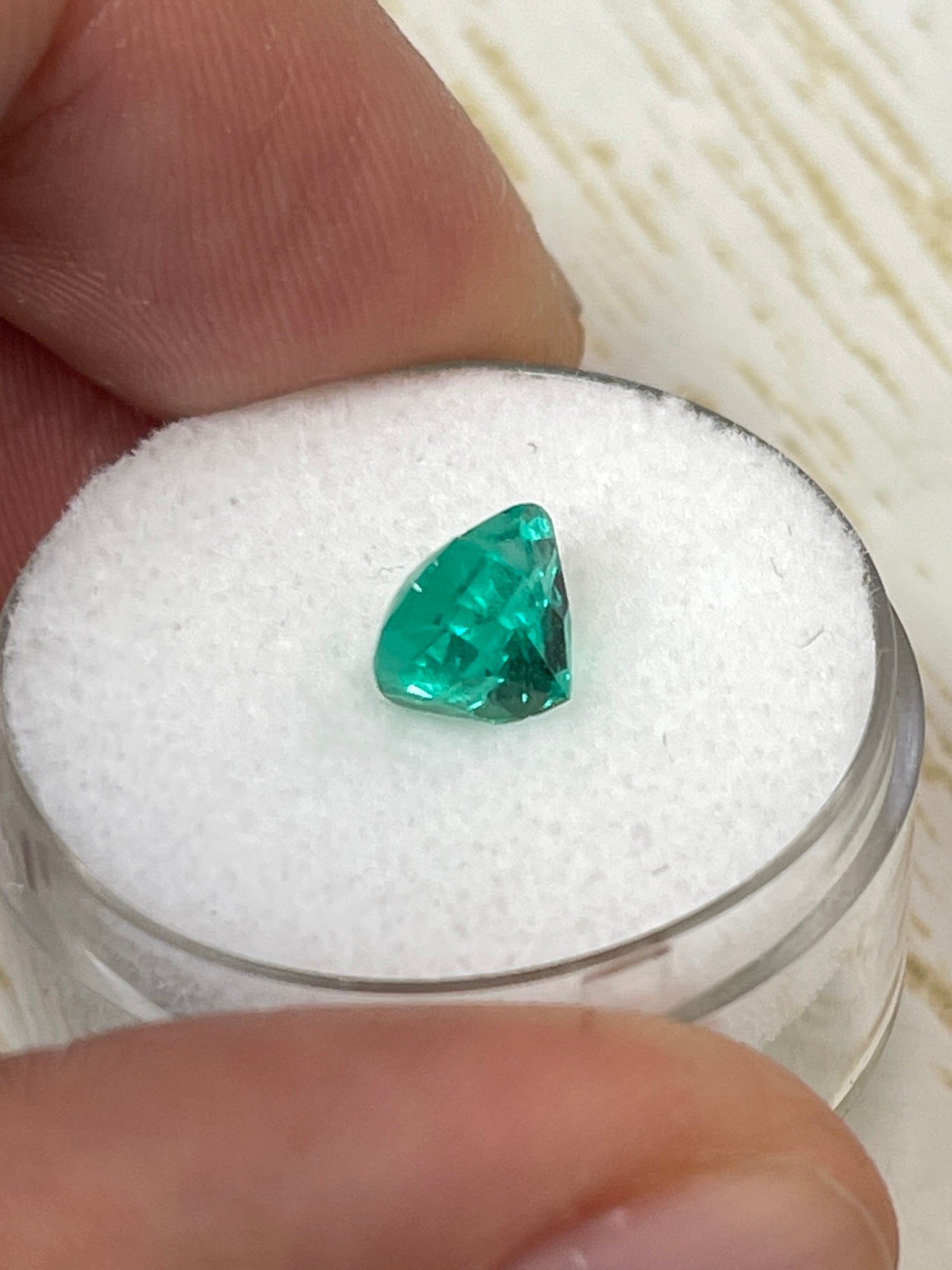 1.62 carat VS clarity green Colombian emerald loose heart-shaped gemstone by JR Colombian Emeralds.