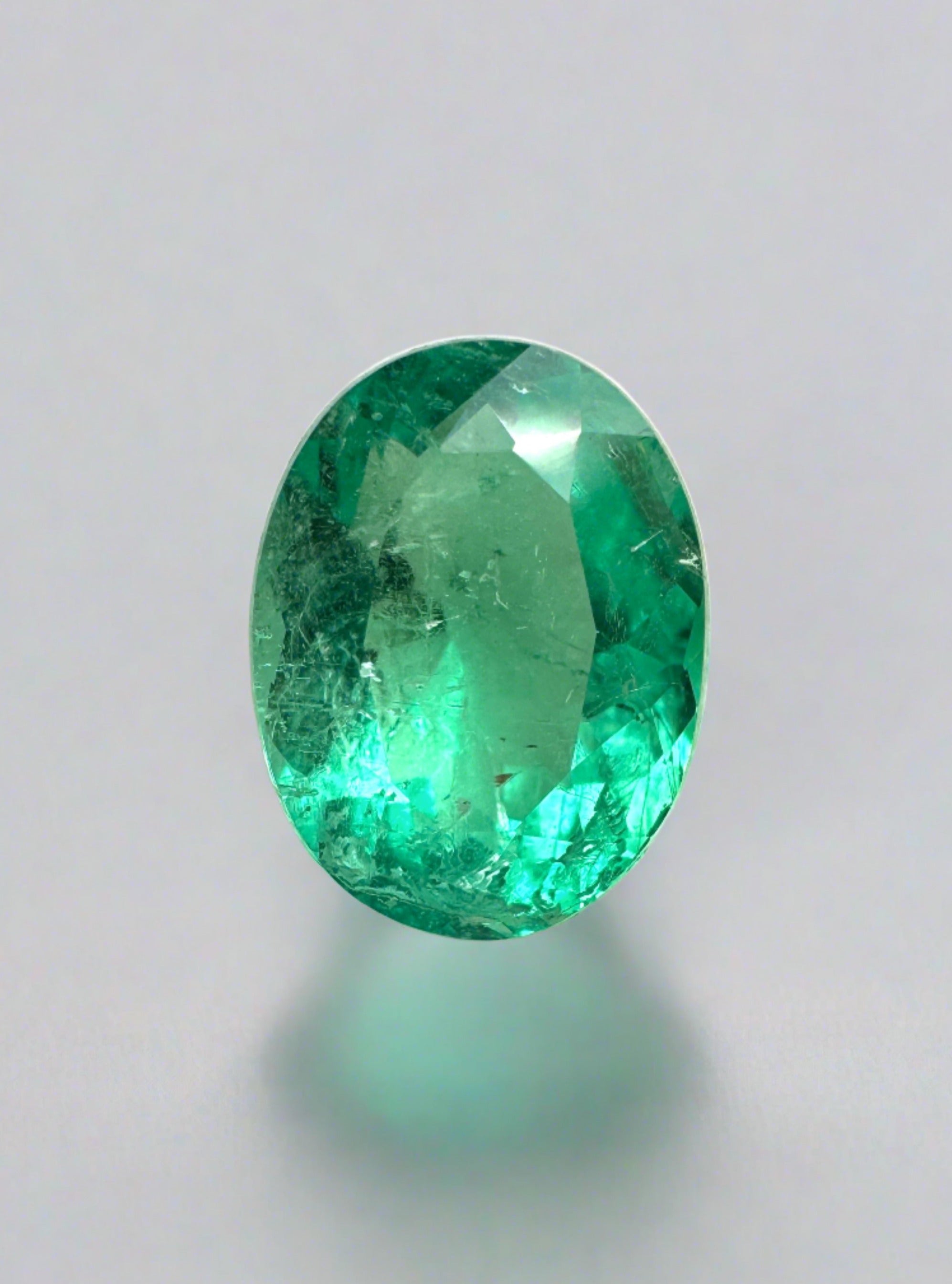 Natural 1.64 carat green Colombian emerald loose oval cut gemstone by JR Colombian Emeralds.
