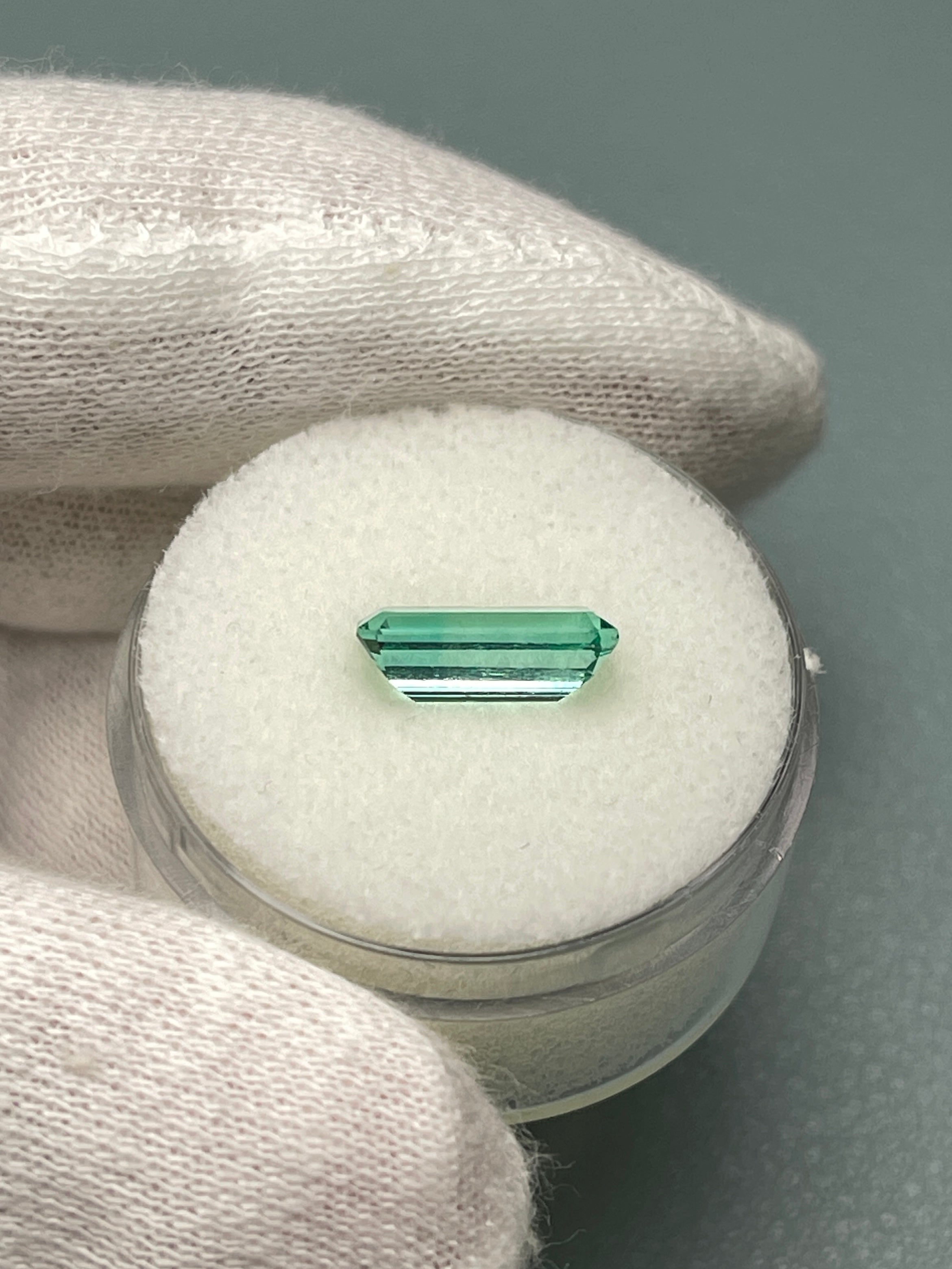 1.65 carat natural Colombian Emerald in elongated emerald cut with crystalline clarity, loose gemstone from JR Colombian Emeralds.
