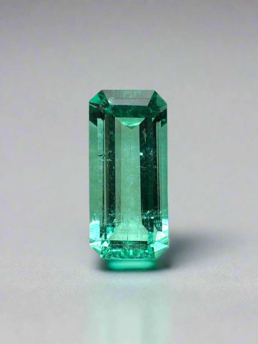 Natural 1.65 carat Colombian emerald loose gemstone, elongated emerald cut, crystalline clarity, from JR Colombian Emeralds.
