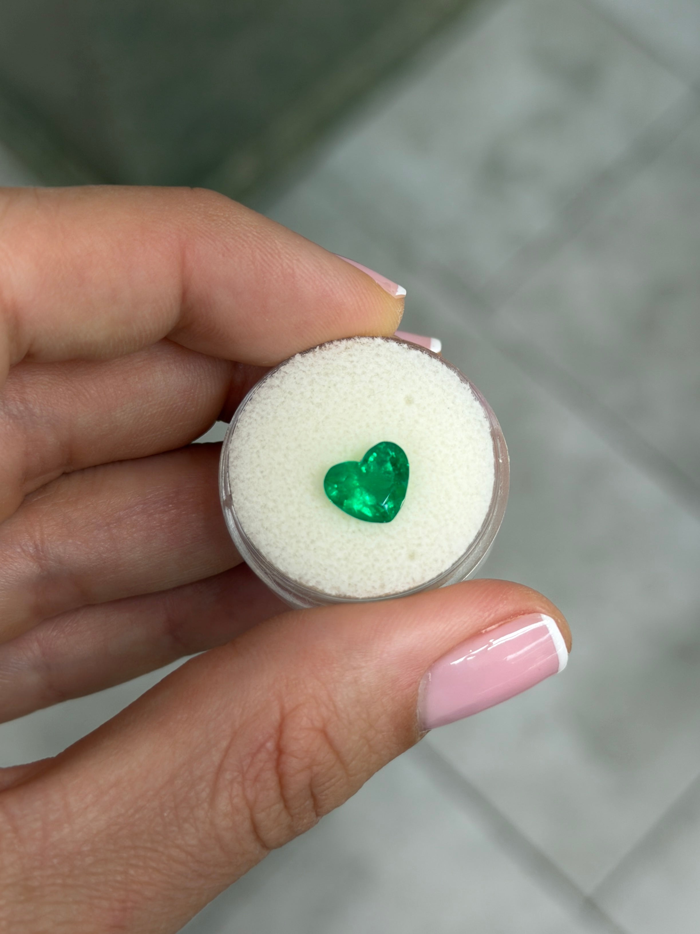 1.65 carat AAA+ vivid intense Muzo green Colombian emerald loose heart cut gemstone by JR Colombian Emeralds.