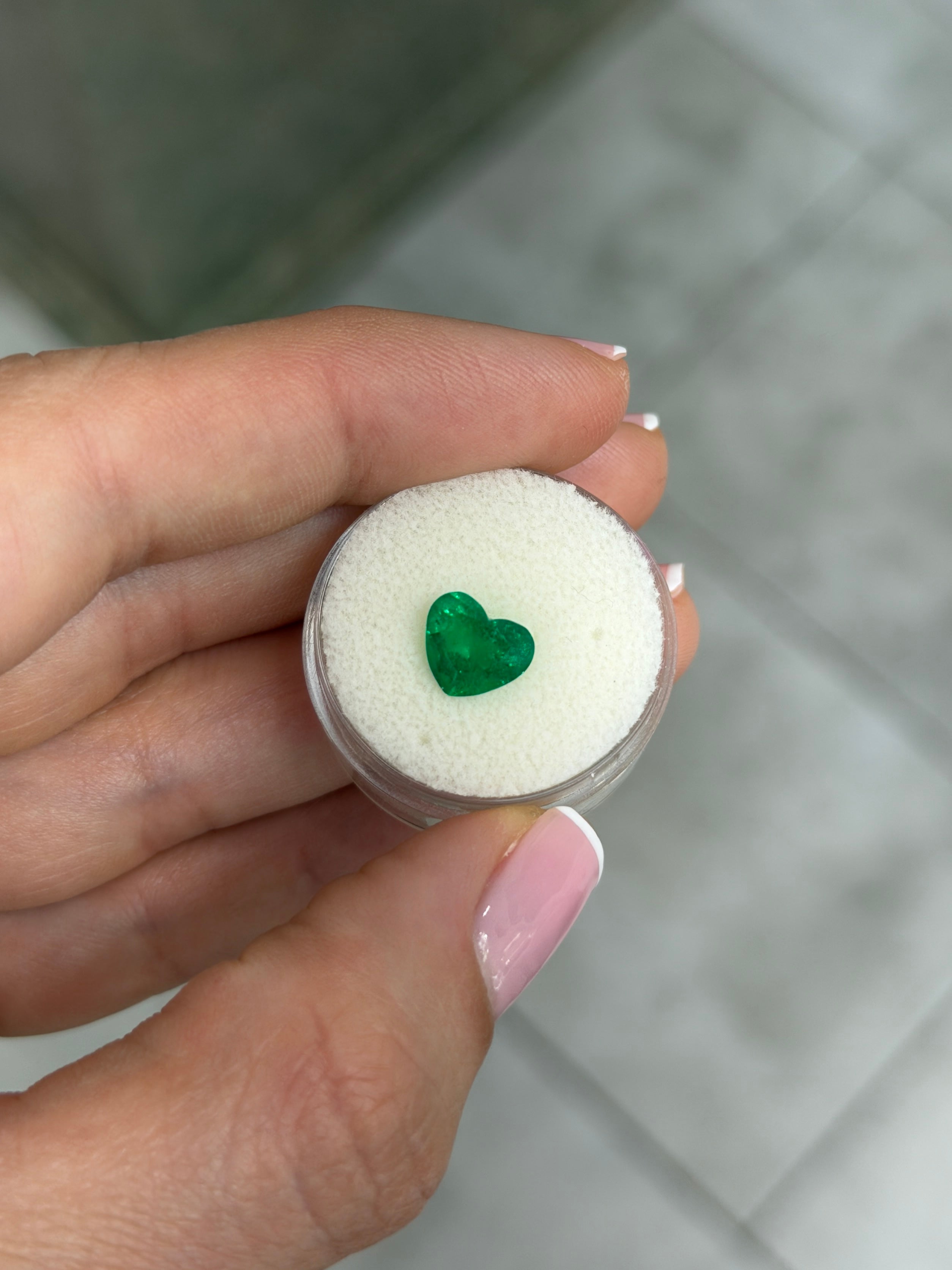 AAA+ Vivid Intense Muzo Green Colombian Emerald, 1.65 Carat heart-shaped loose gemstone from JR Colombian Emeralds.