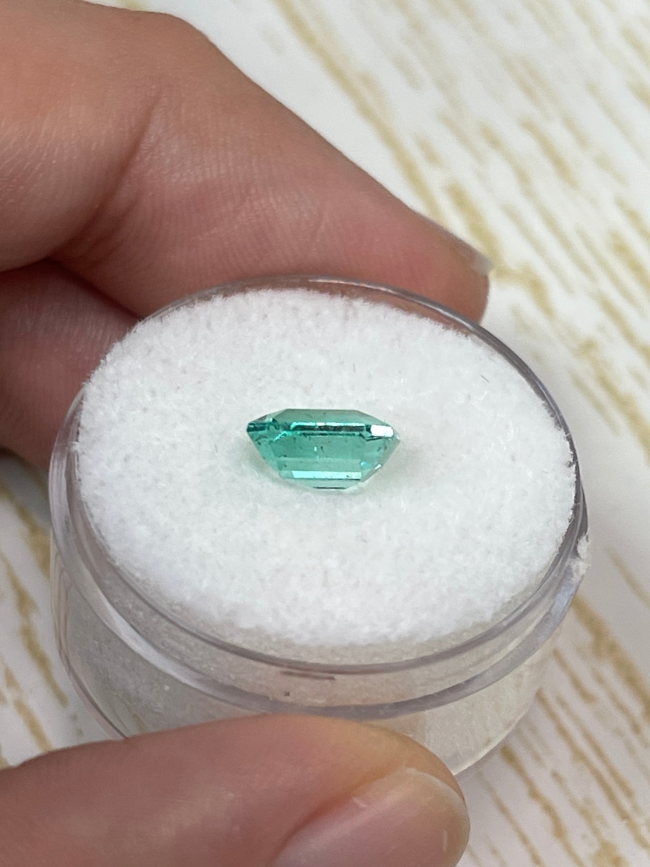 1.74 carat freckled Colombian emerald in Asscher cut, loose gemstone with portrait cut and natural inclusions, by JR Colombian Emeralds.