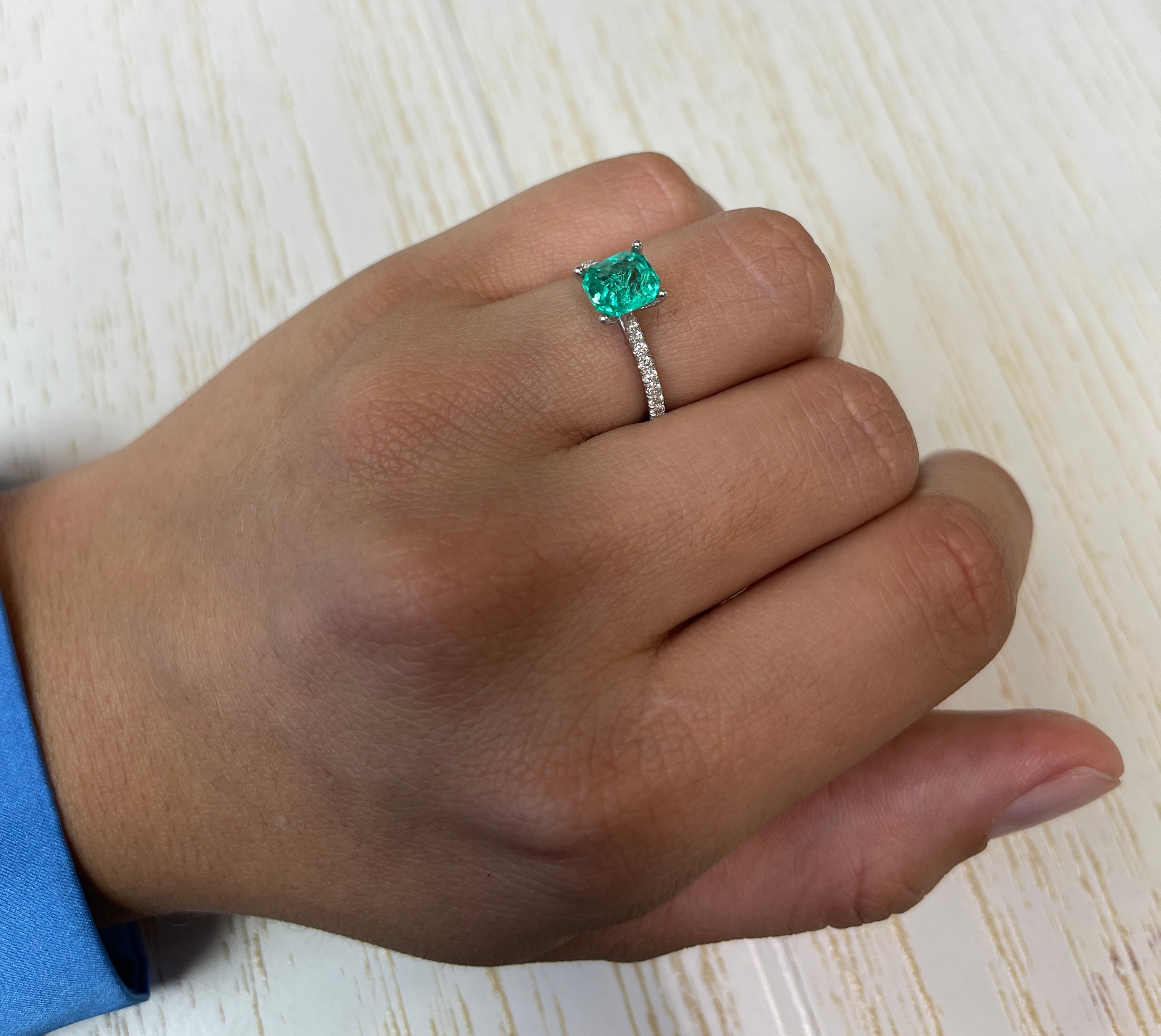 1.79 carat crystalline green Colombian emerald in 7.5x7 mm Asscher cut, natural, unset, from JR Colombian Emeralds.