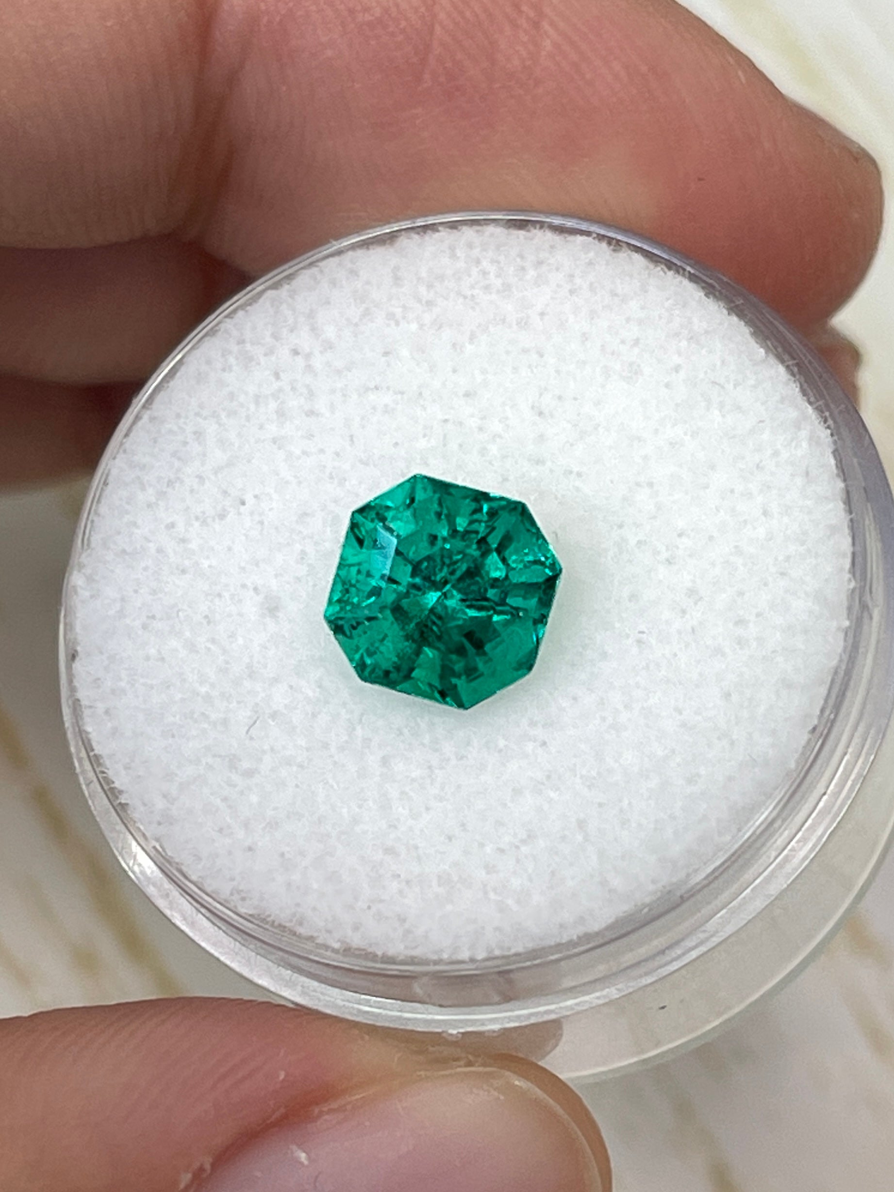 Unset 1.80 carat Muzo green Colombian emerald Asscher cut gemstone with AAA+ clarity, natural unmounted gemstone from JR Colombian Emeralds.