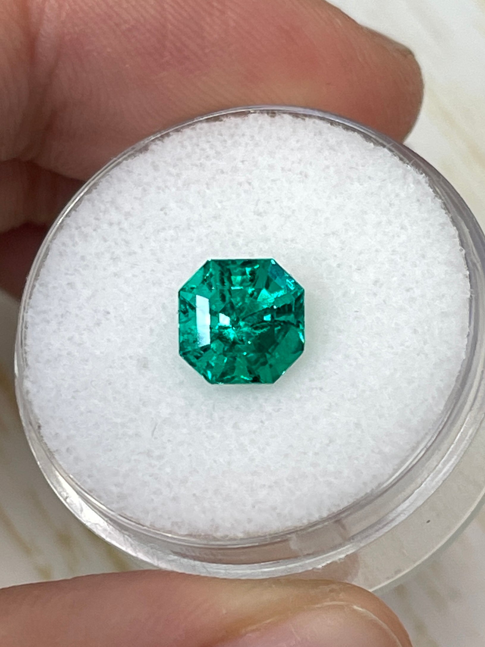 Unset 1.80 carat Muzo green Colombian emerald Asscher cut gemstone with AAA+ quality from JR Colombian Emeralds.