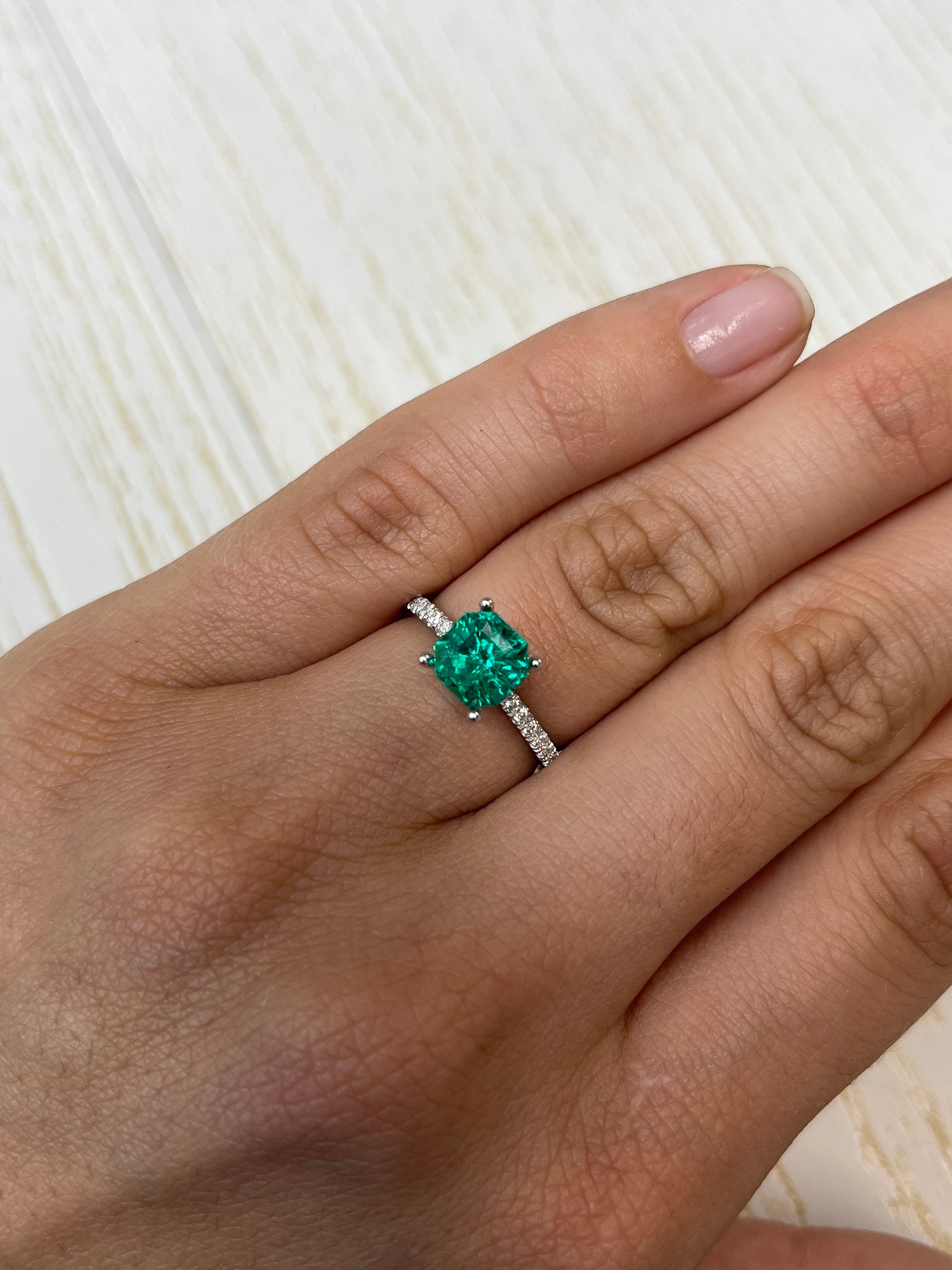 1.80 carat AAA+ Muzo green Asscher cut Colombian emerald from JR Colombian Emeralds, natural unset gemstone with vibrant green color.