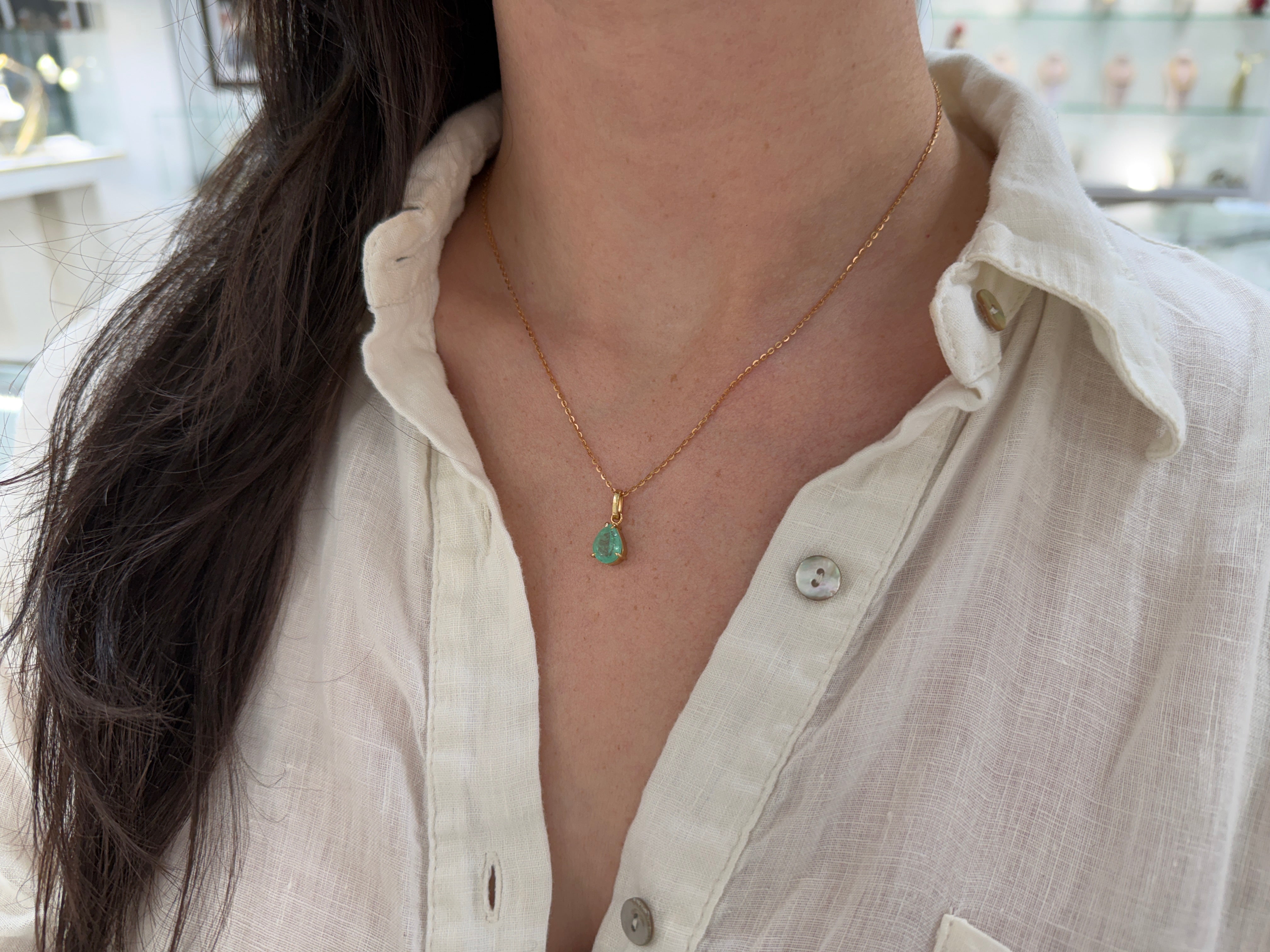 Light green Colombian emerald solitaire necklace featuring a 1.80 carat pear-shaped emerald by JR Colombian Emeralds.