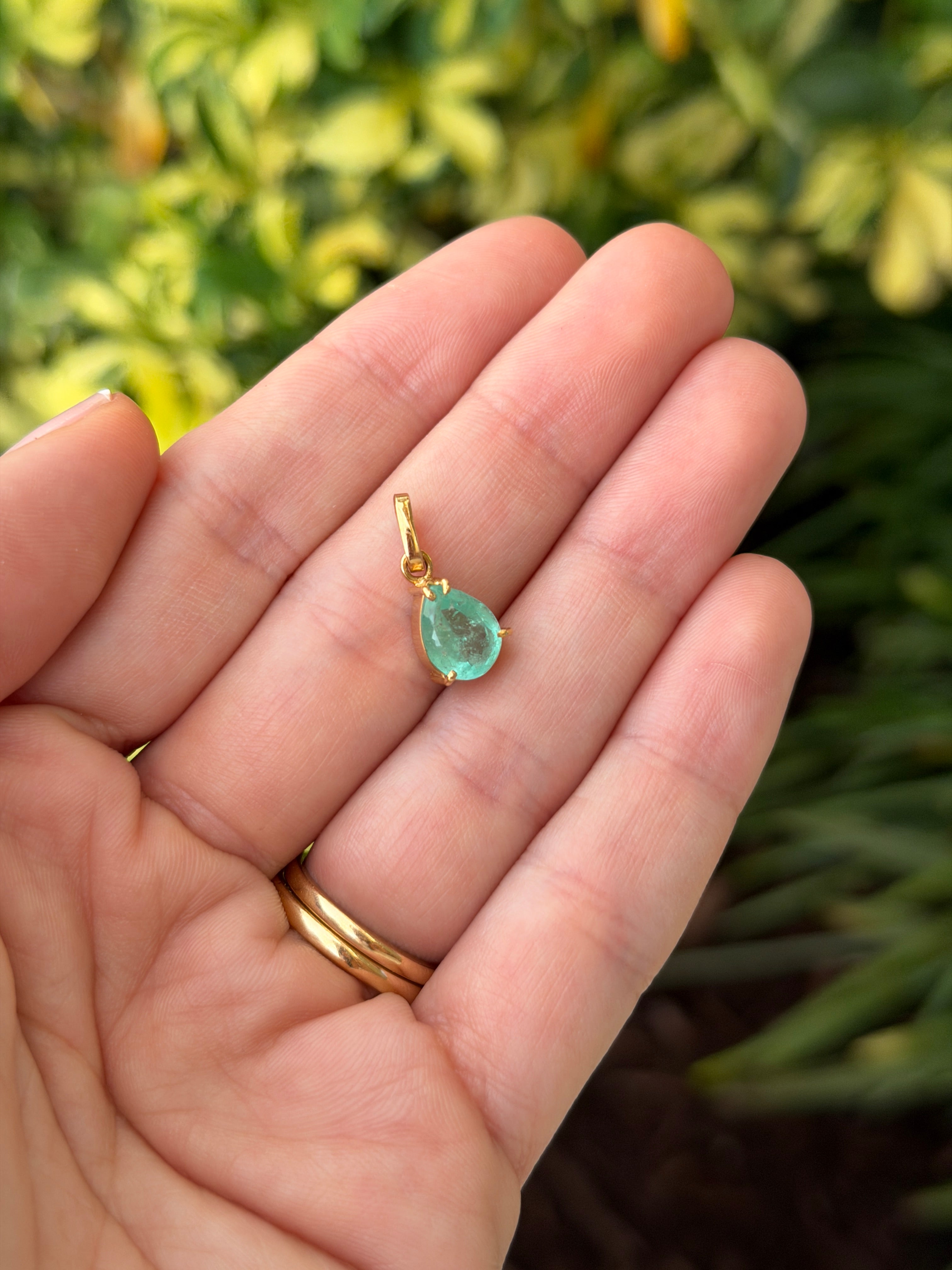 Light green Colombian emerald solitaire necklace with 1.80 carat pear-shaped emerald by JR Colombian Emeralds.
