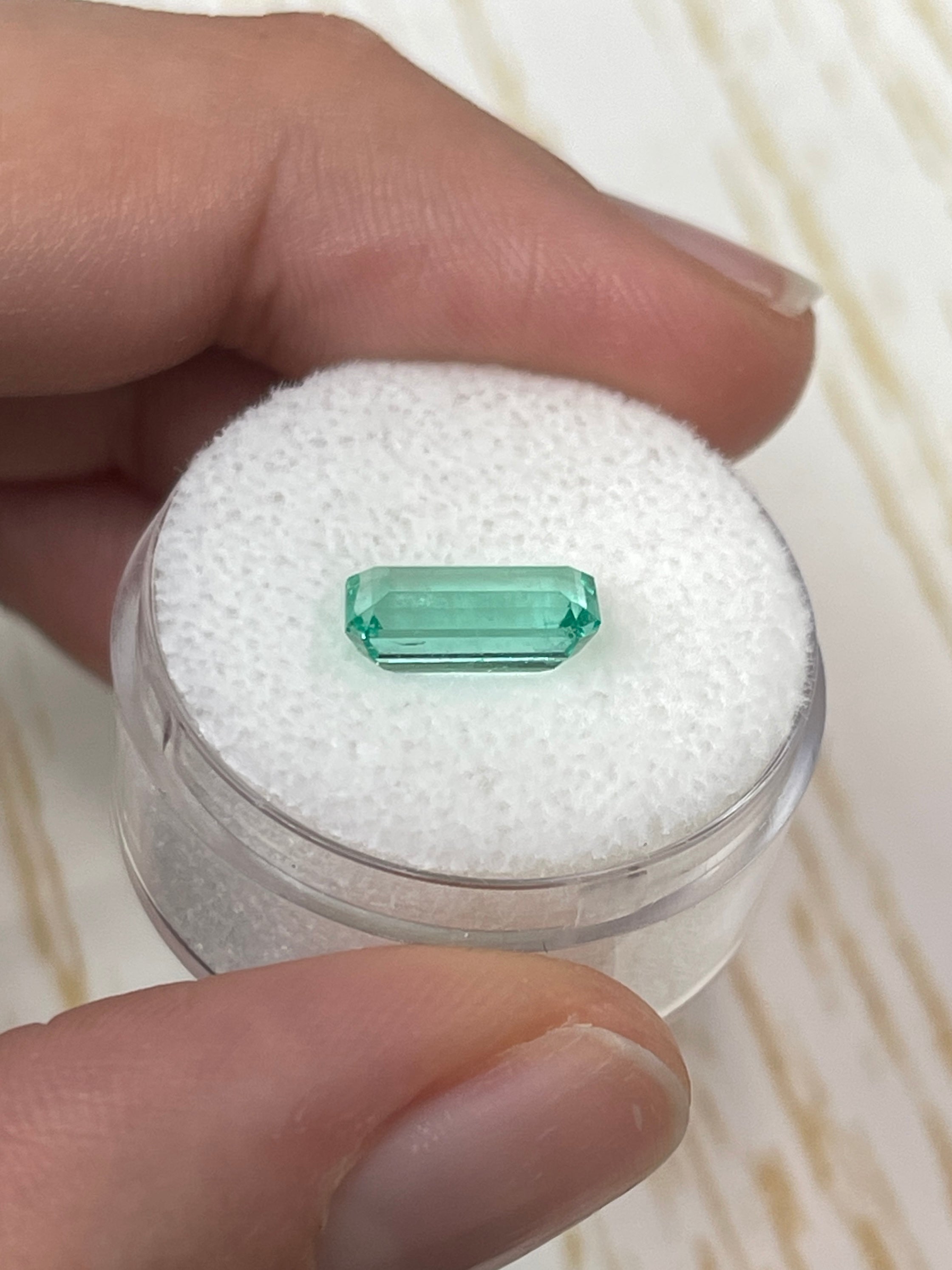 VVS 1.80 Carat bluish green Colombian emerald cut loose gemstone from JR Colombian Emeralds, slender 10x6 mm shape.