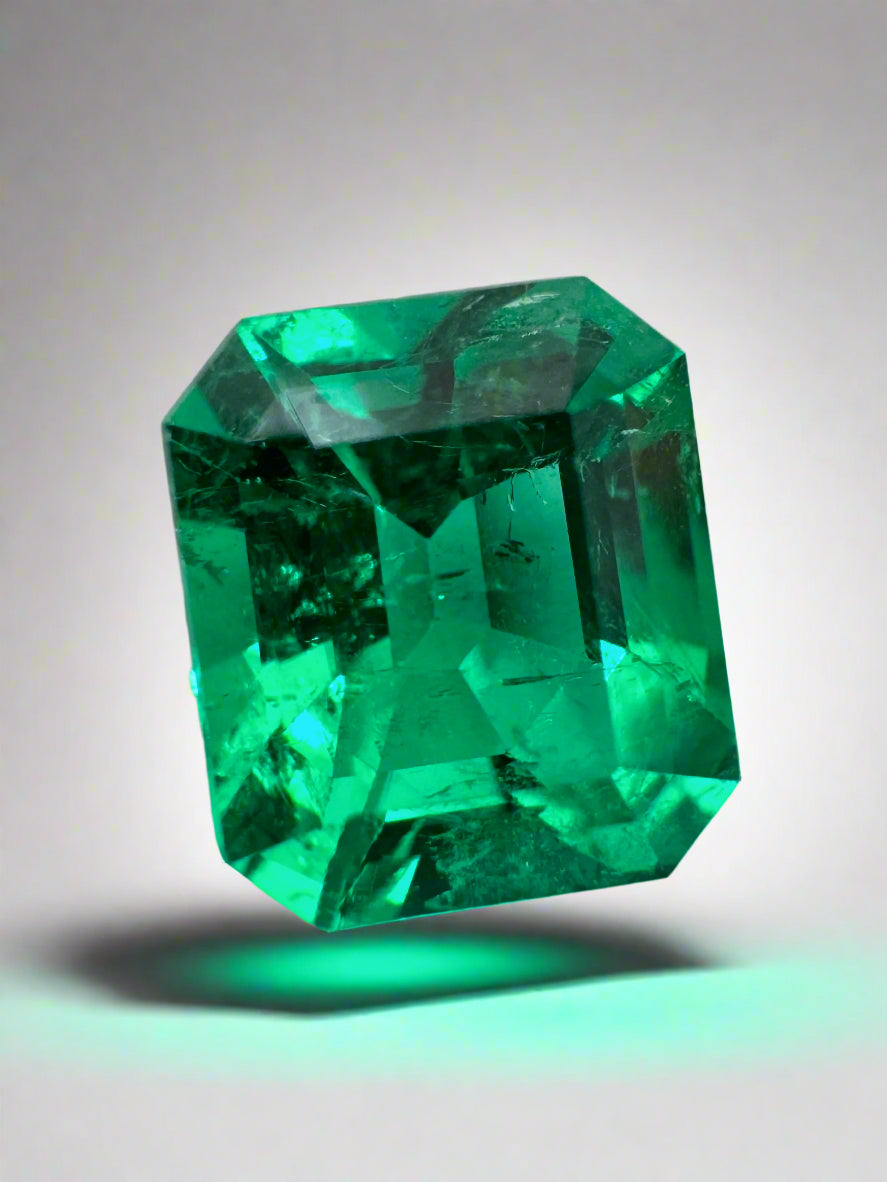 8x7 mm vivid yellowish-green Colombian emerald in emerald cut, loose gemstone from JR Colombian Emeralds.