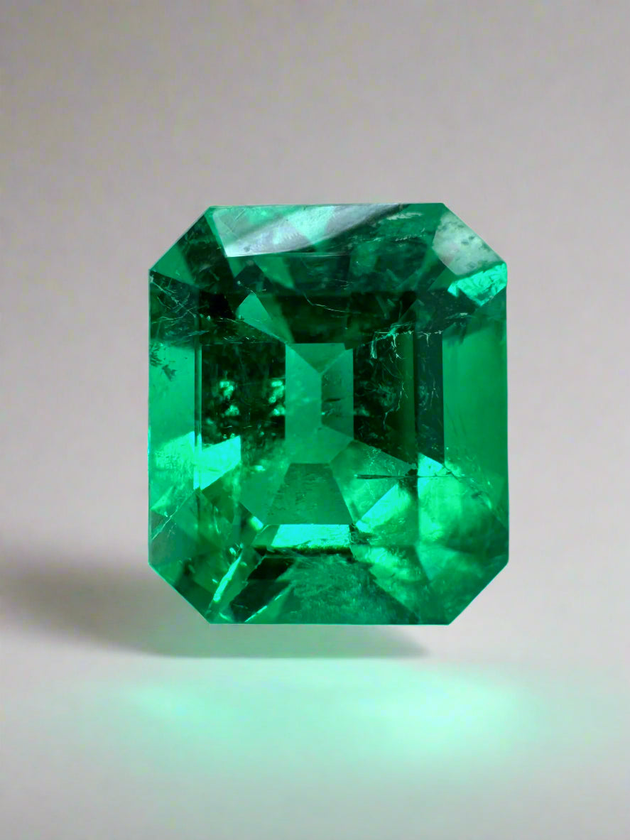 Vivid yellowish green 1.82 carat Colombian emerald cut loose gemstone from JR Colombian Emeralds.
