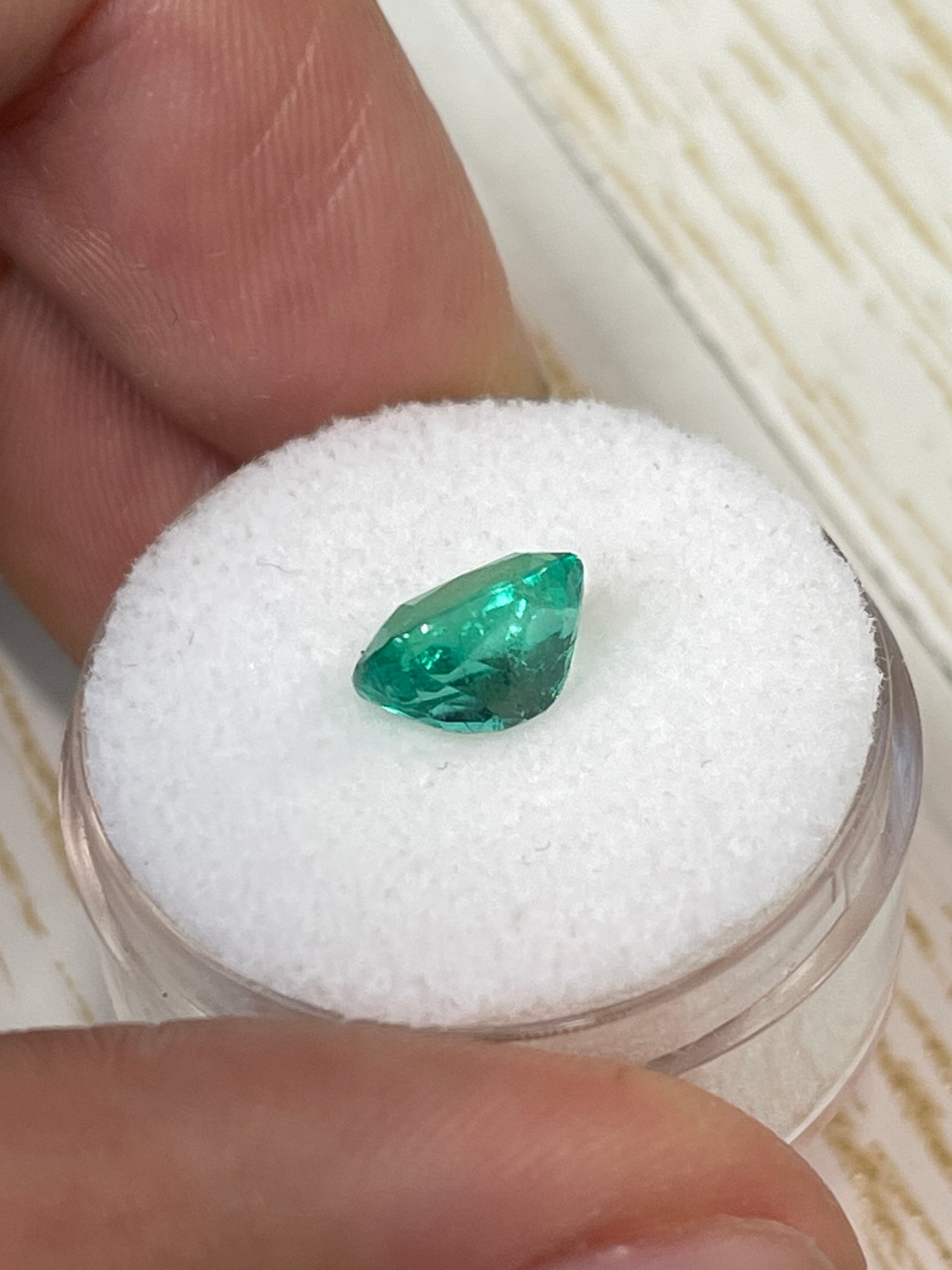 1.84 carat medium bluish green Colombian emerald loose cushion cut gemstone from JR Colombian Emeralds.
