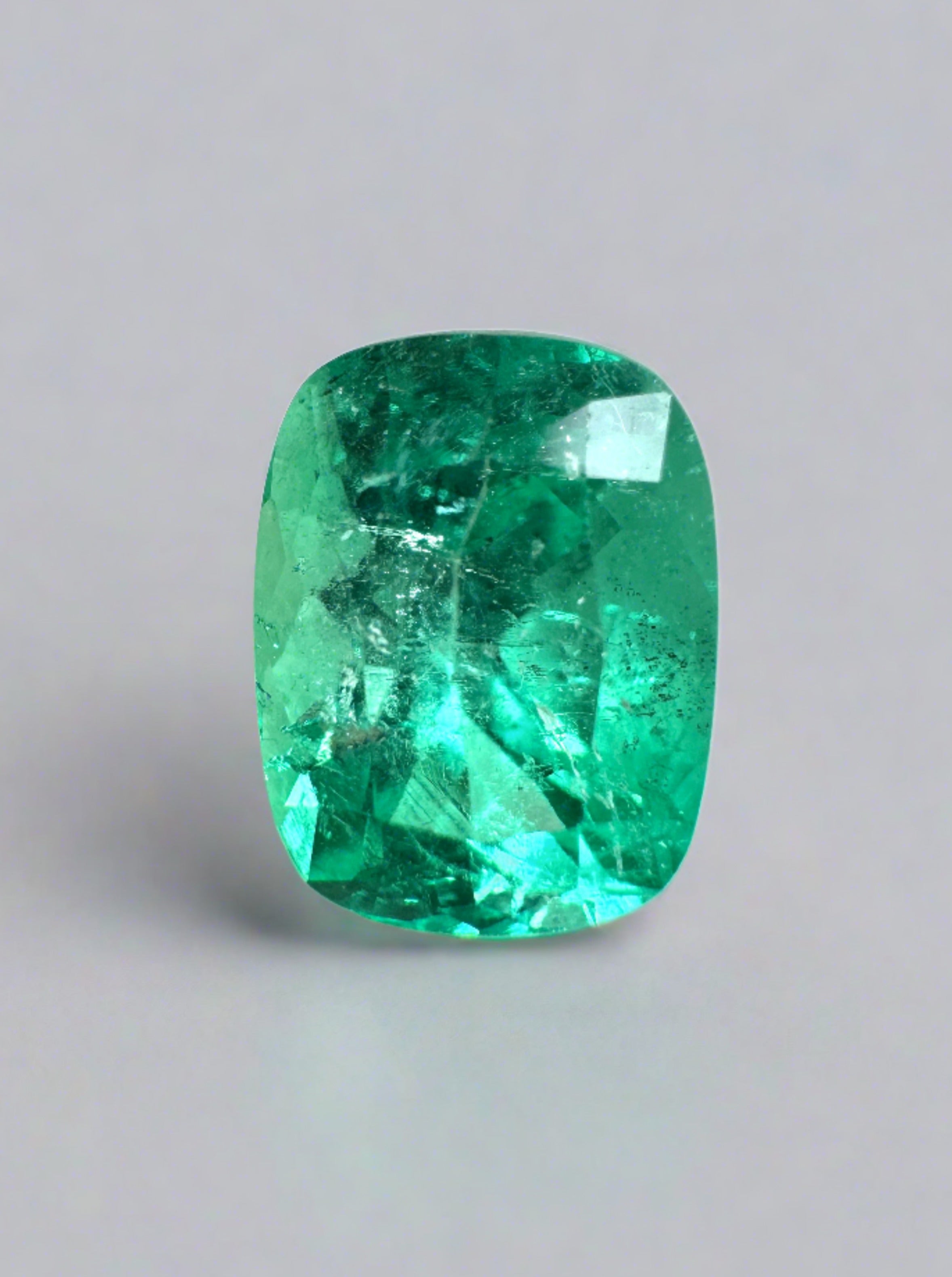 1.84 carat medium bluish-green Colombian emerald loose cushion cut gem, natural and vibrant, from JR Colombian Emeralds.