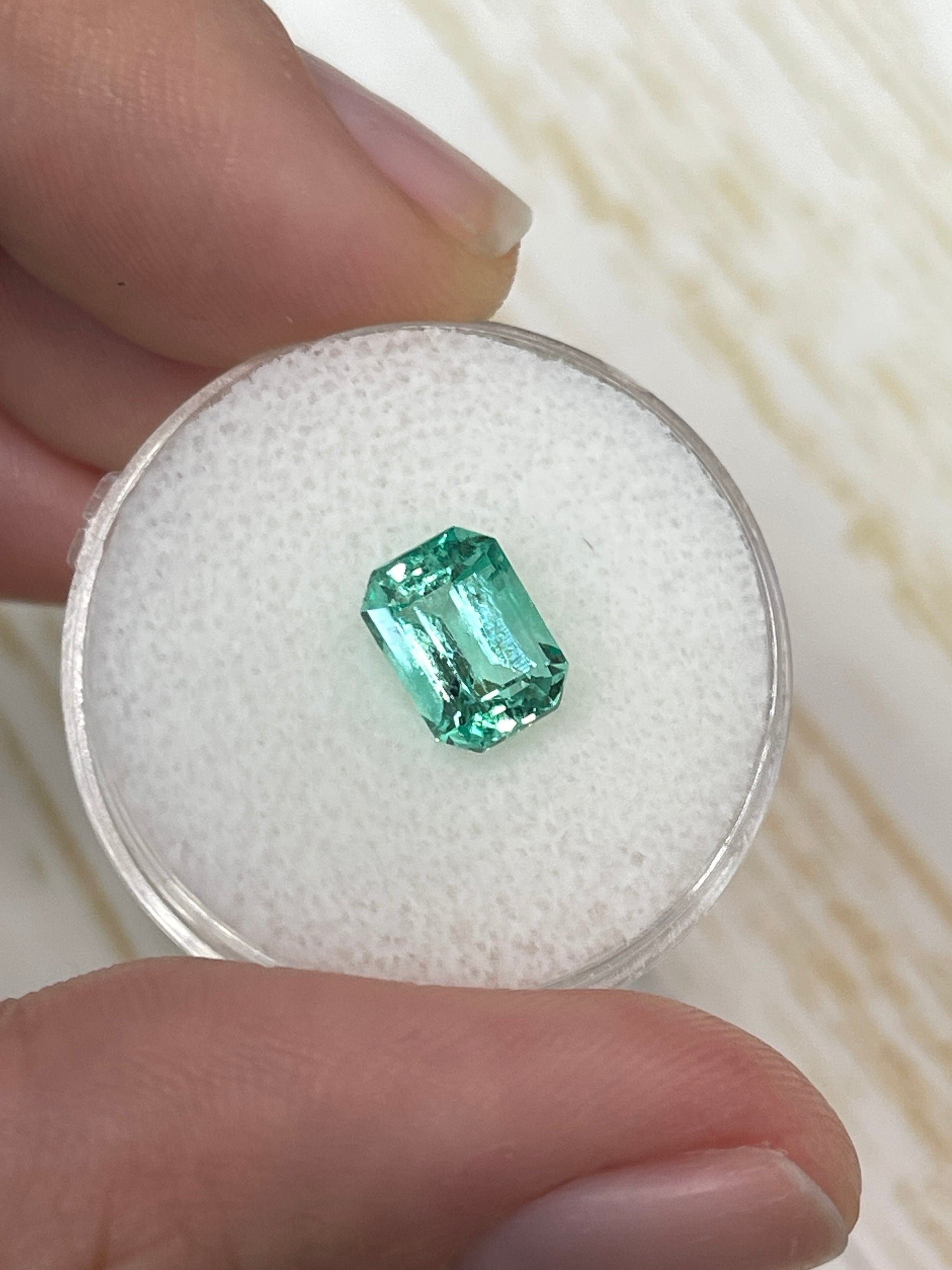 Green natural Colombian emerald loose gemstone, 1.91 carats, 8x6 mm emerald cut, from JR Colombian Emeralds.