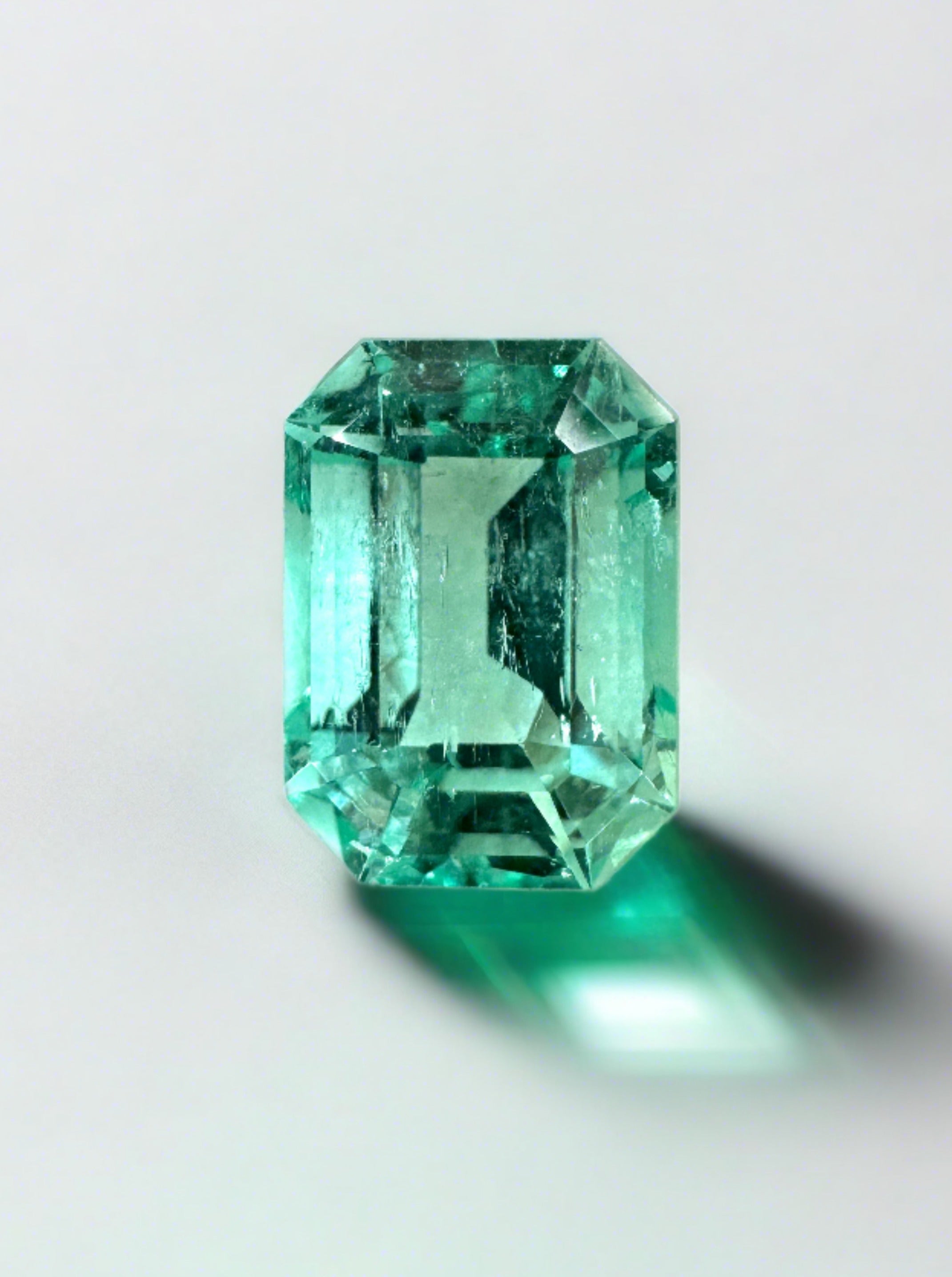 1.91 carat natural Colombian emerald loose gemstone with emerald cut, vibrant green color, ideal astrological quality by JR Colombian Emeralds.