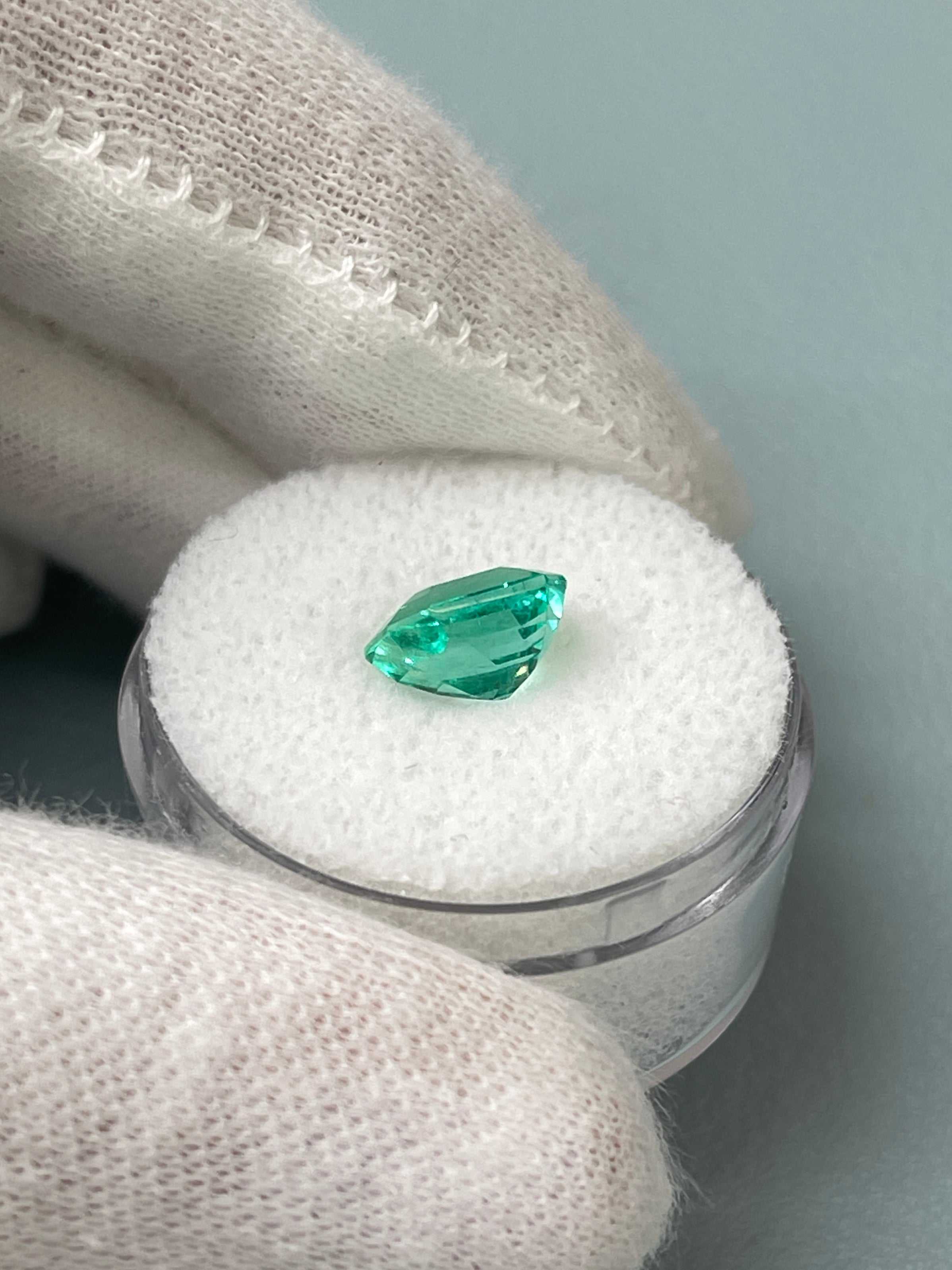 Loose 1.92 carat bluish green Colombian emerald with emerald cut, showcasing a radiant, natural gemstone from JR Colombian Emeralds.