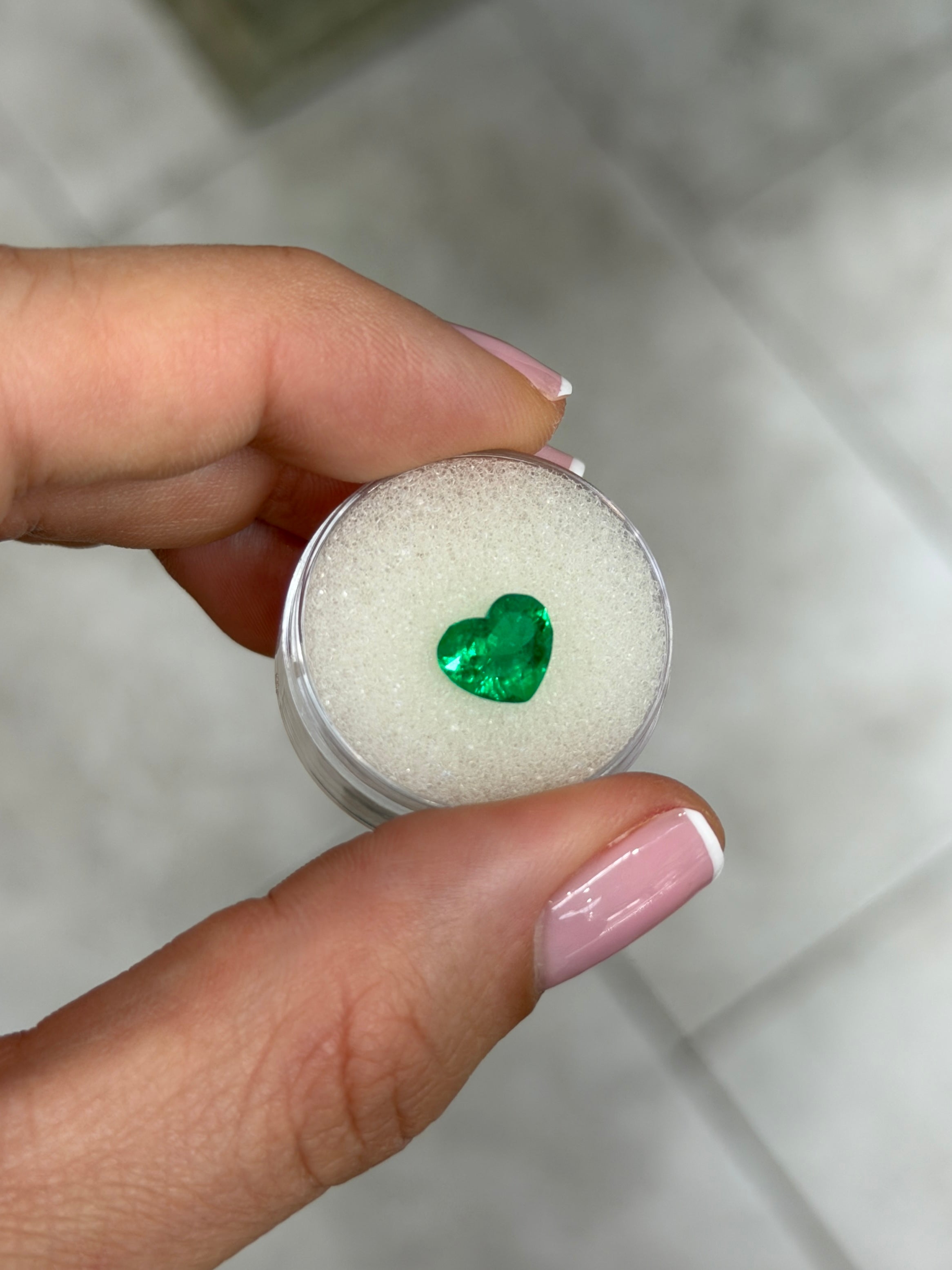 1.94 carat AAA+ Vivid Intense Muzo green Colombian emerald loose heart cut gemstone by JR Colombian Emeralds.